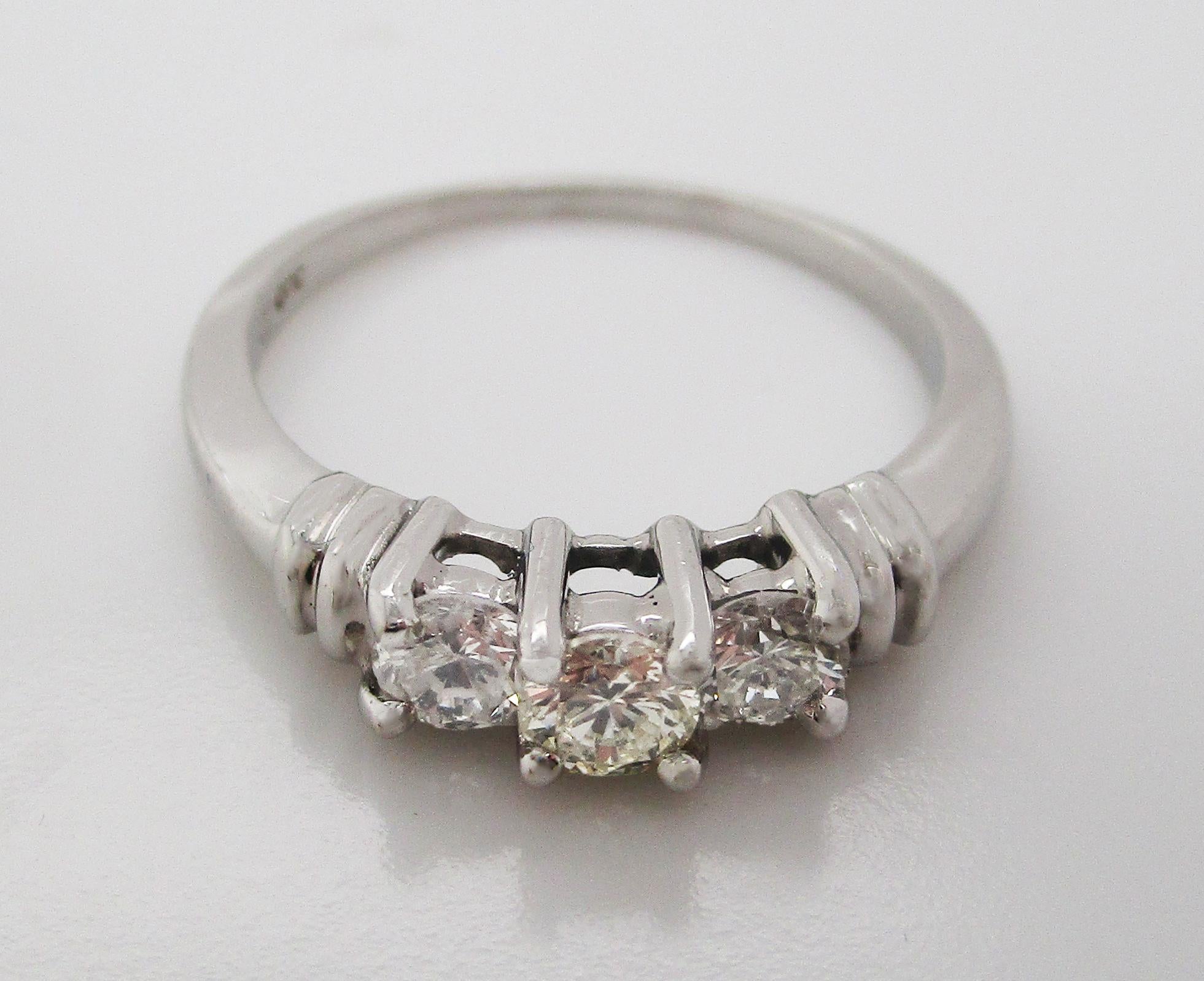 Women's or Men's Contemporary Platinum Three-Stone Diamond Engagement Ring