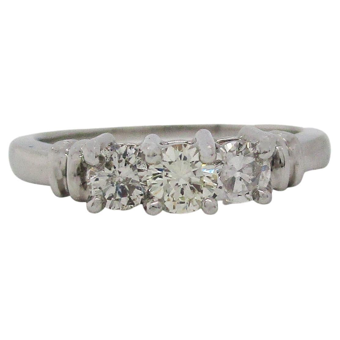 Contemporary Platinum Three-Stone Diamond Engagement Ring For Sale