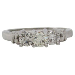 Contemporary Platinum Three-Stone Diamond Engagement Ring