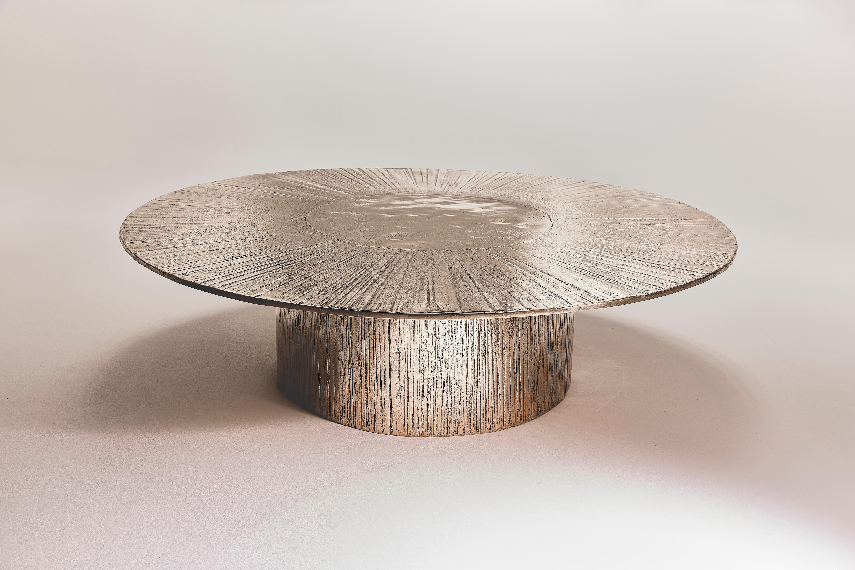 Bonze Round Coffee Table by Colo Studio

Limited and numbered edition of 8 pieces + 4 AP, handmade in France.
Bespoke dimensions and patinas upon request.

Material: Bronze, golden polish
Dimensions: H 33 x Ø 120 cm
Year: 2024

The bronze high