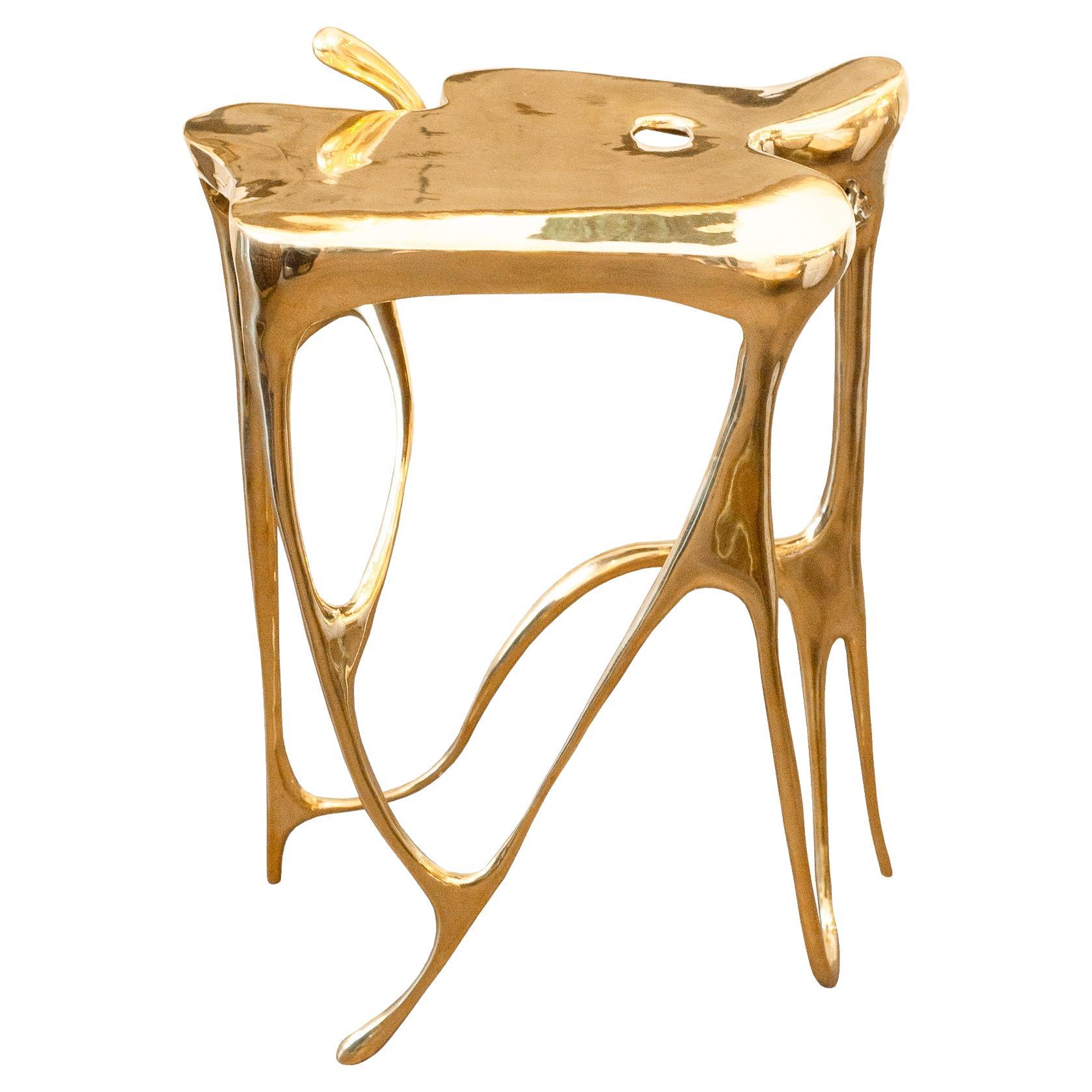 Table d'appoint sculpturale contemporaine en laiton moulé poli