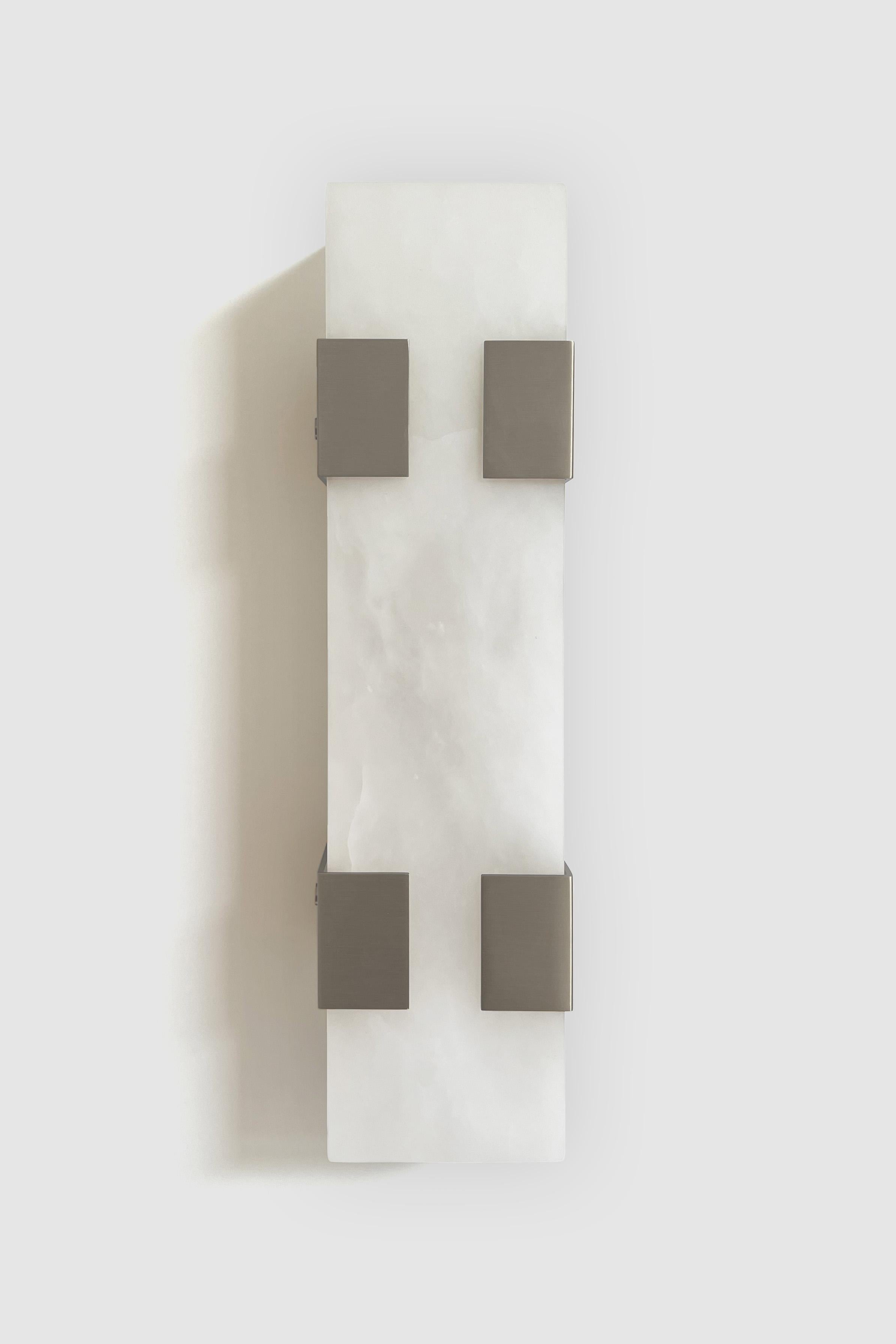 Orphan Work 003-4C Sconce
Shown in brushed nickel and alabaster 
Available in brushed brass, brushed nickel and blackened brass. 
Measures: 5 3/8”H x 19”W x 3 7/8”D
Wall or ceiling mount
Vertical or horizontal
Plug-in by request
1-4 adjustable