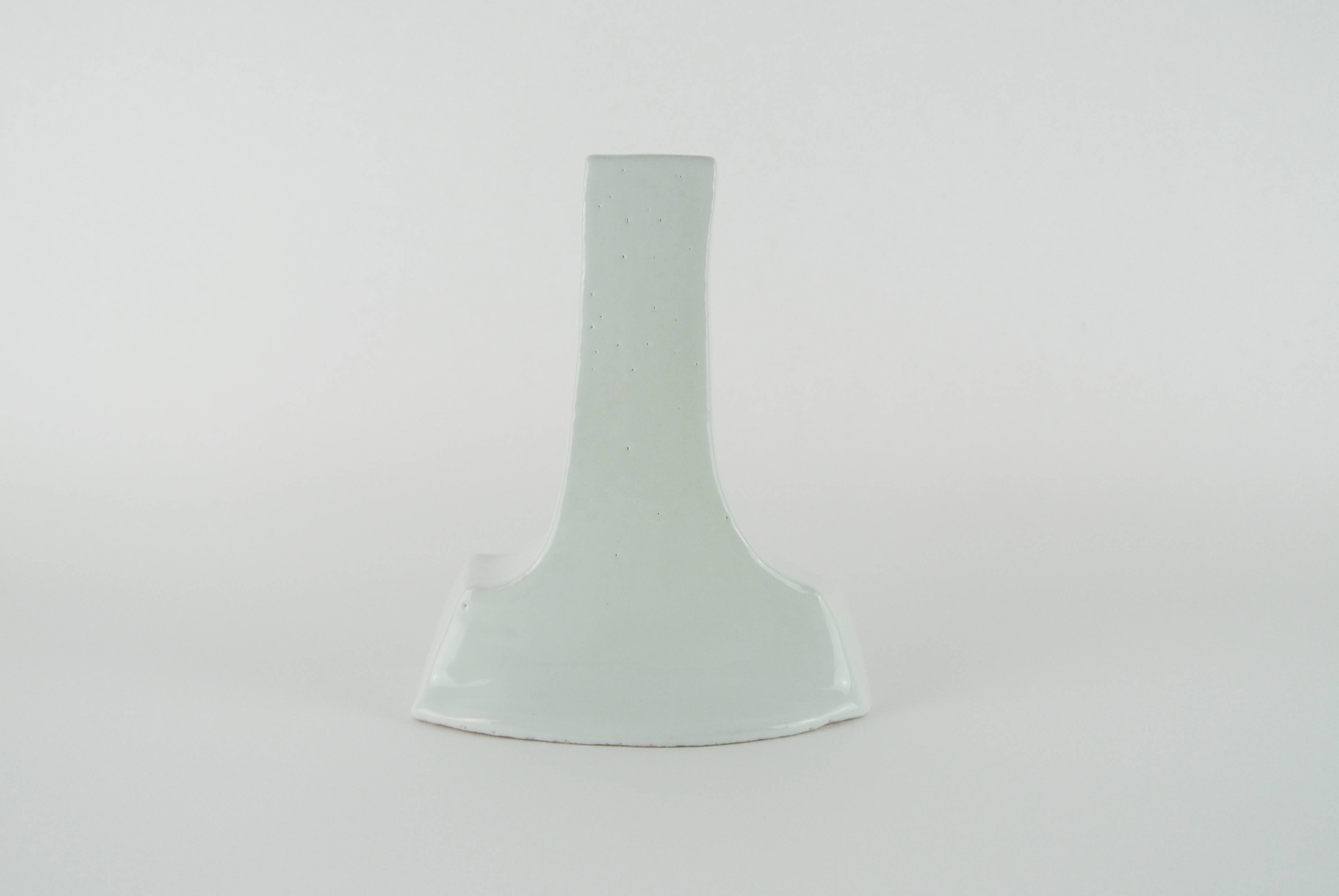 Hand build single light candle holder in white porcelain and white glossy glaze. Small sporadic spots visible on surface. Suitable for a 2.5 cm wide candle.
All pieces by Christine Roland celebrate the imperfections that occur from working with a