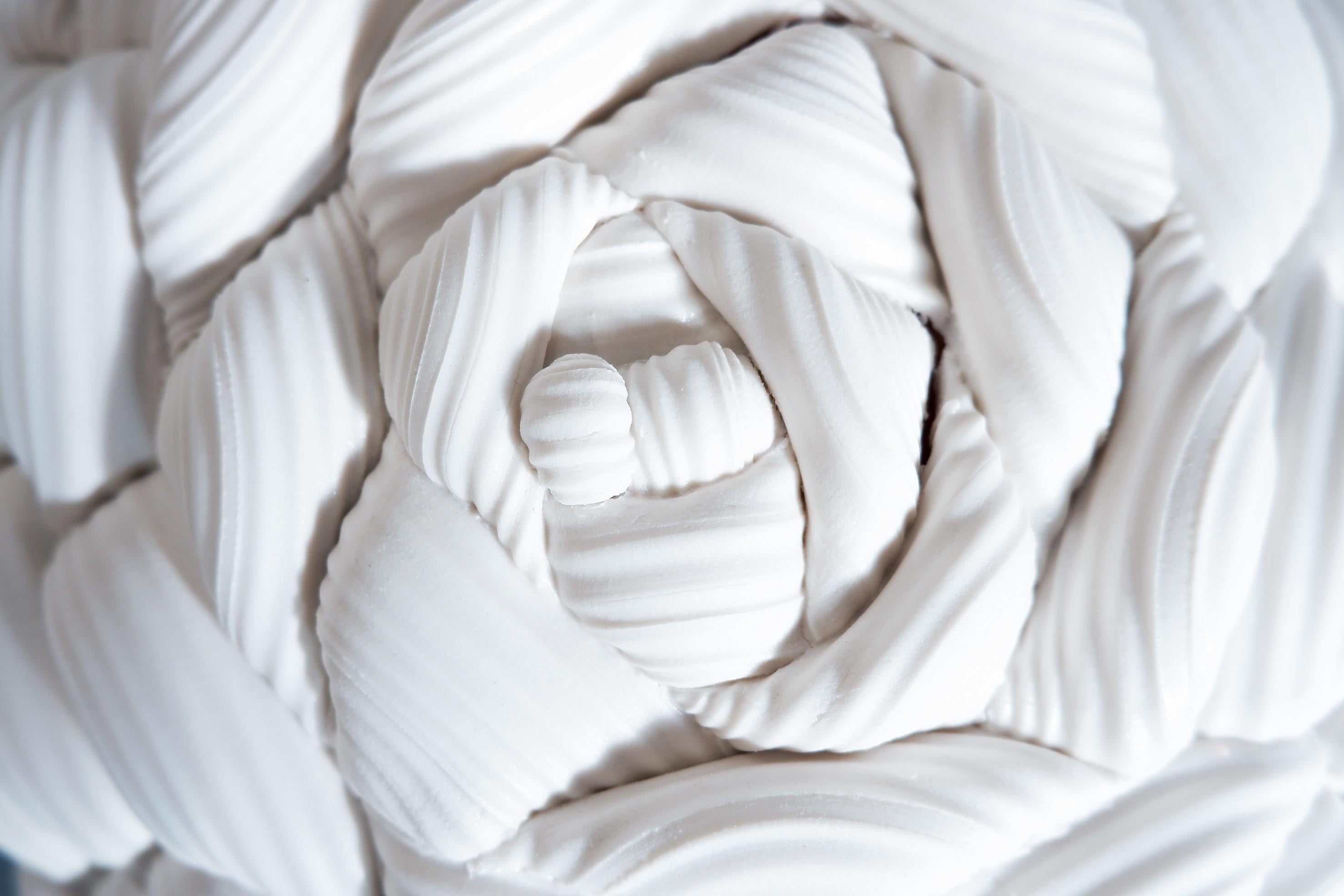 Monochromatic Fold is part of an ongoing series of ceramic sculptures that explore the boundaries of material, the language of making and the characteristics of form. It has been developed from applying fixed processes to making and assembled from