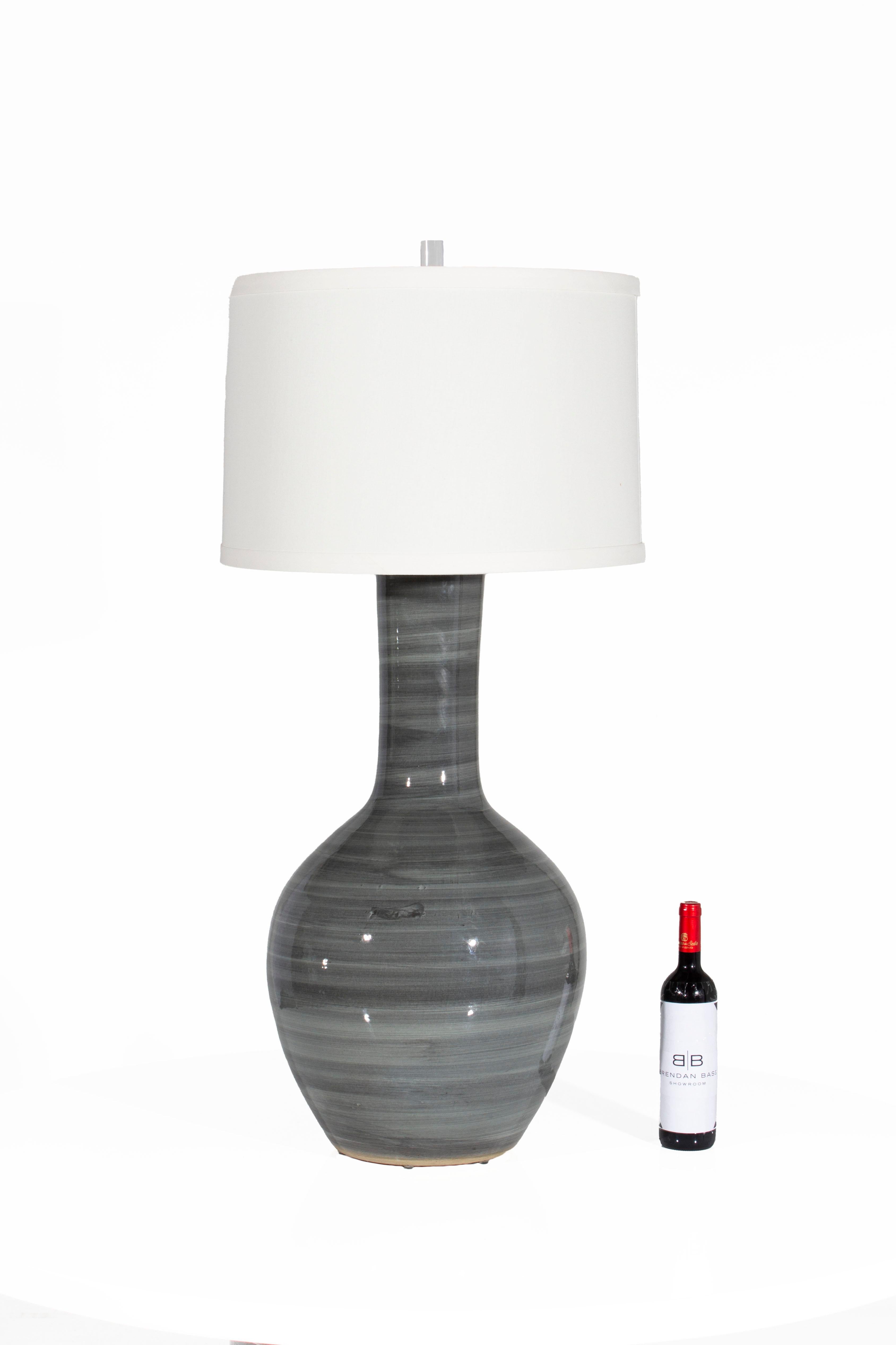 Contemporary porcelain vase form as lamp

Vase is sourced from Belgium by Brendan Bass. Made in to lamp in Dallas, TX by local artisans.

Measures: Diameter with shade 20