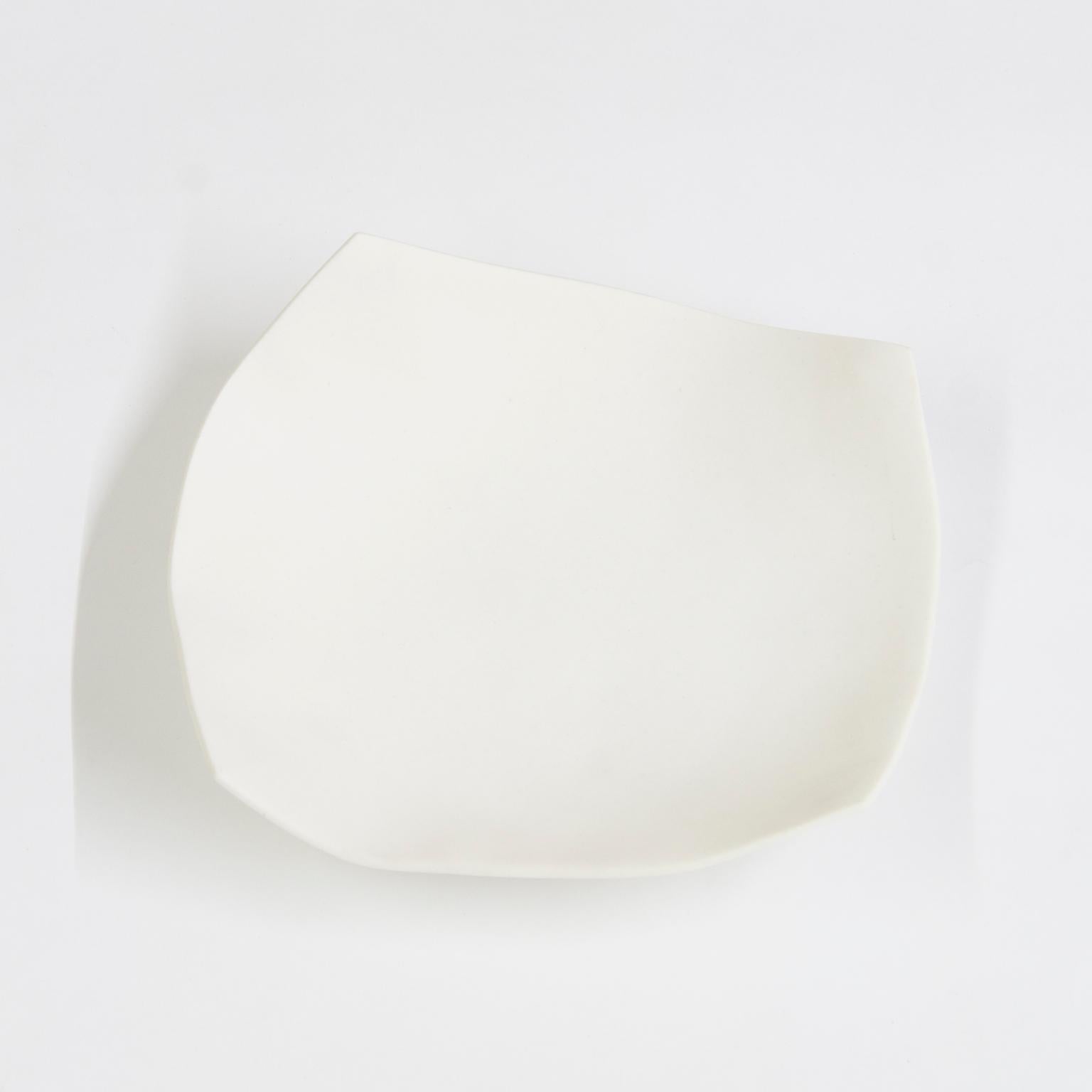 Each service plate is handcrafted by Mexican artisans. Slight variations in shape and size are to be expected and embraced as they add to the uniqueness of every plate. 

This porcelain service plate can be used for decoration or as a service plate.