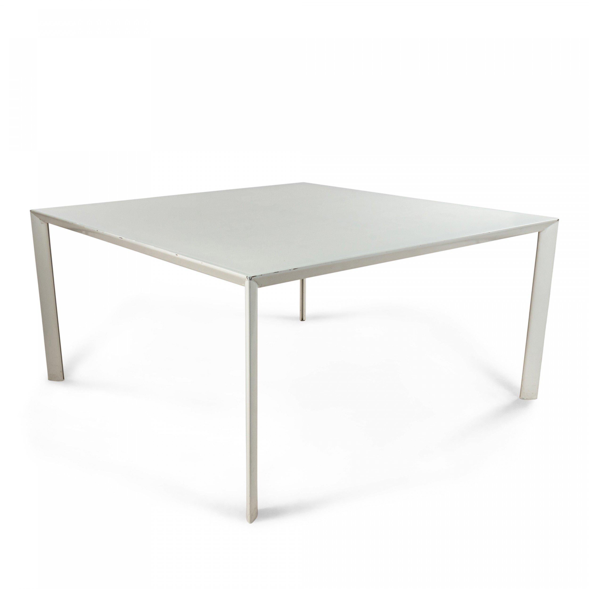 Contemporary large white Porro square work tables with white metal legs.