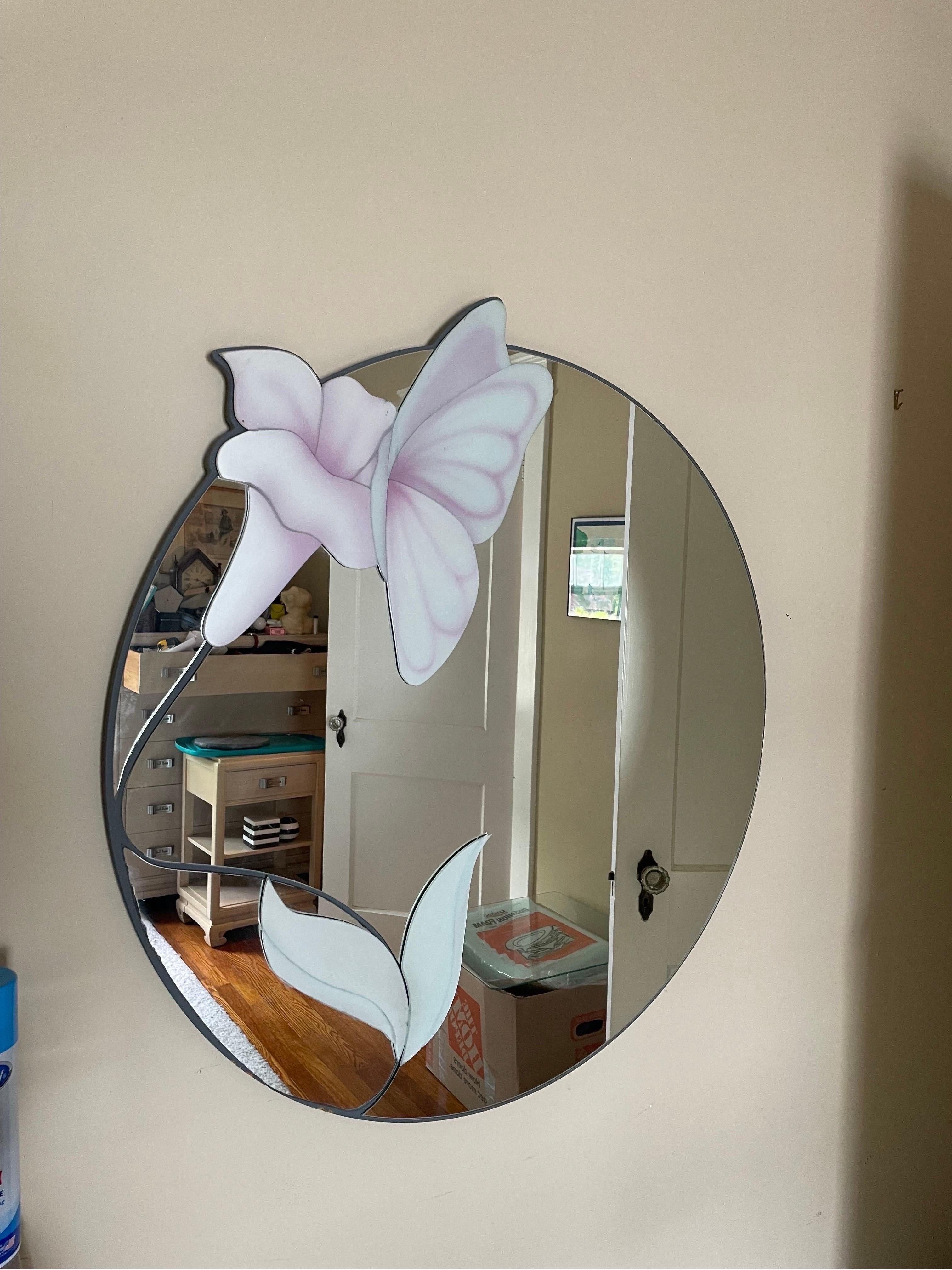 David Marshall signature styling. Frosted Floral mirror wit Butterfly. Very soothing color palette.