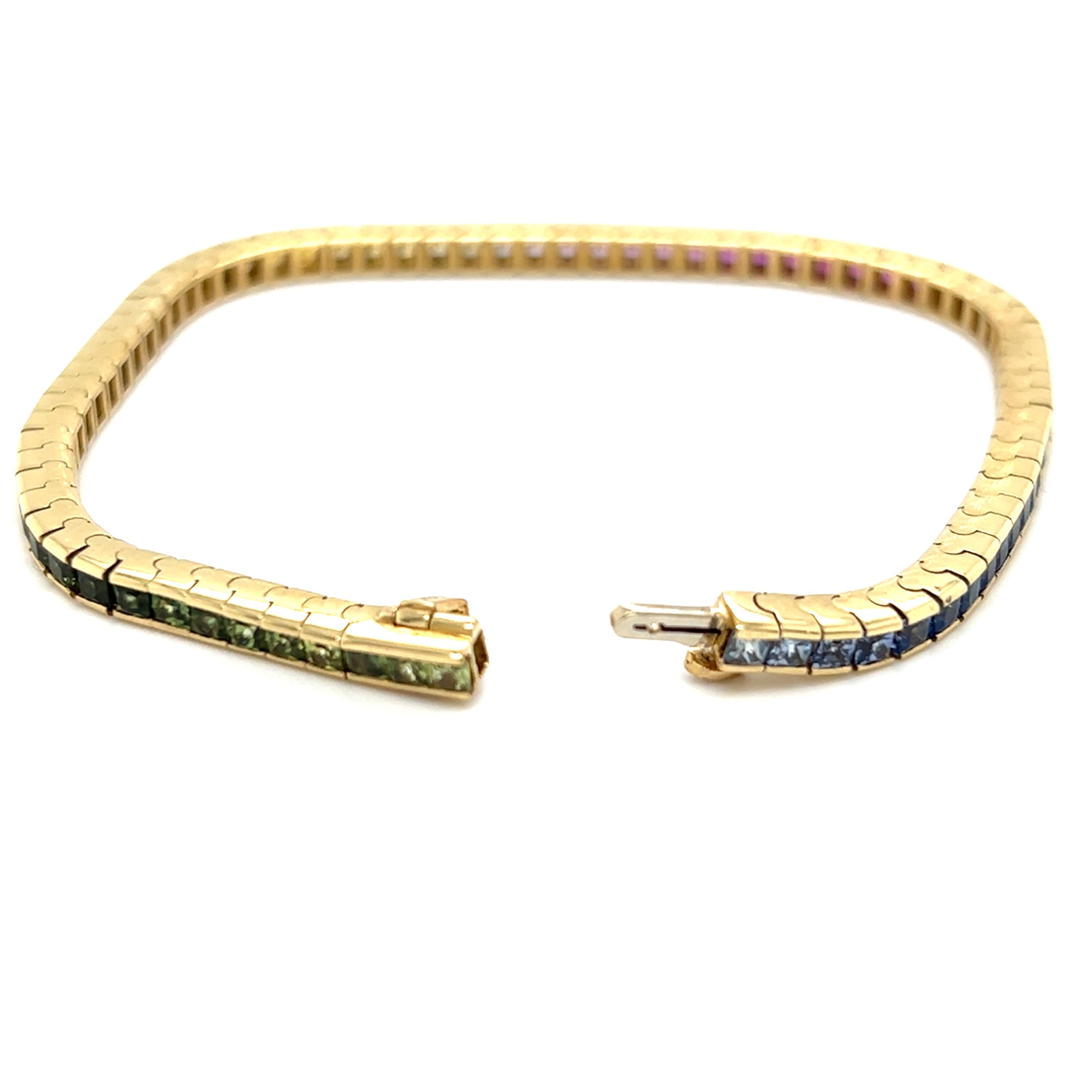 Contemporary Princess Cut Rainbow Sapphire Tennis Bracelet in 18K Yellow Gold In Good Condition In Towson, MD