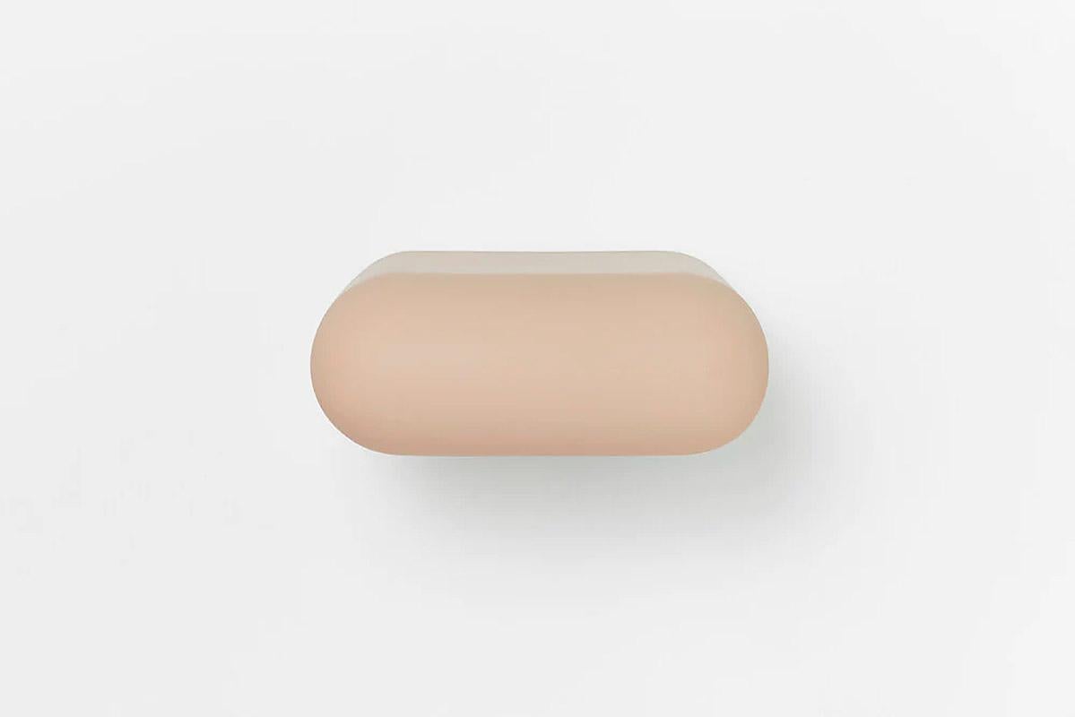 Contemporary wooden cantilever drawer, Roly-Poly by Faye Toogood
This is shown in the putty wooden finish. 

A self-contained drawer sculpted in a curvilinear form. The runners are engineered to slide to a gentle close.

This product is meticulously