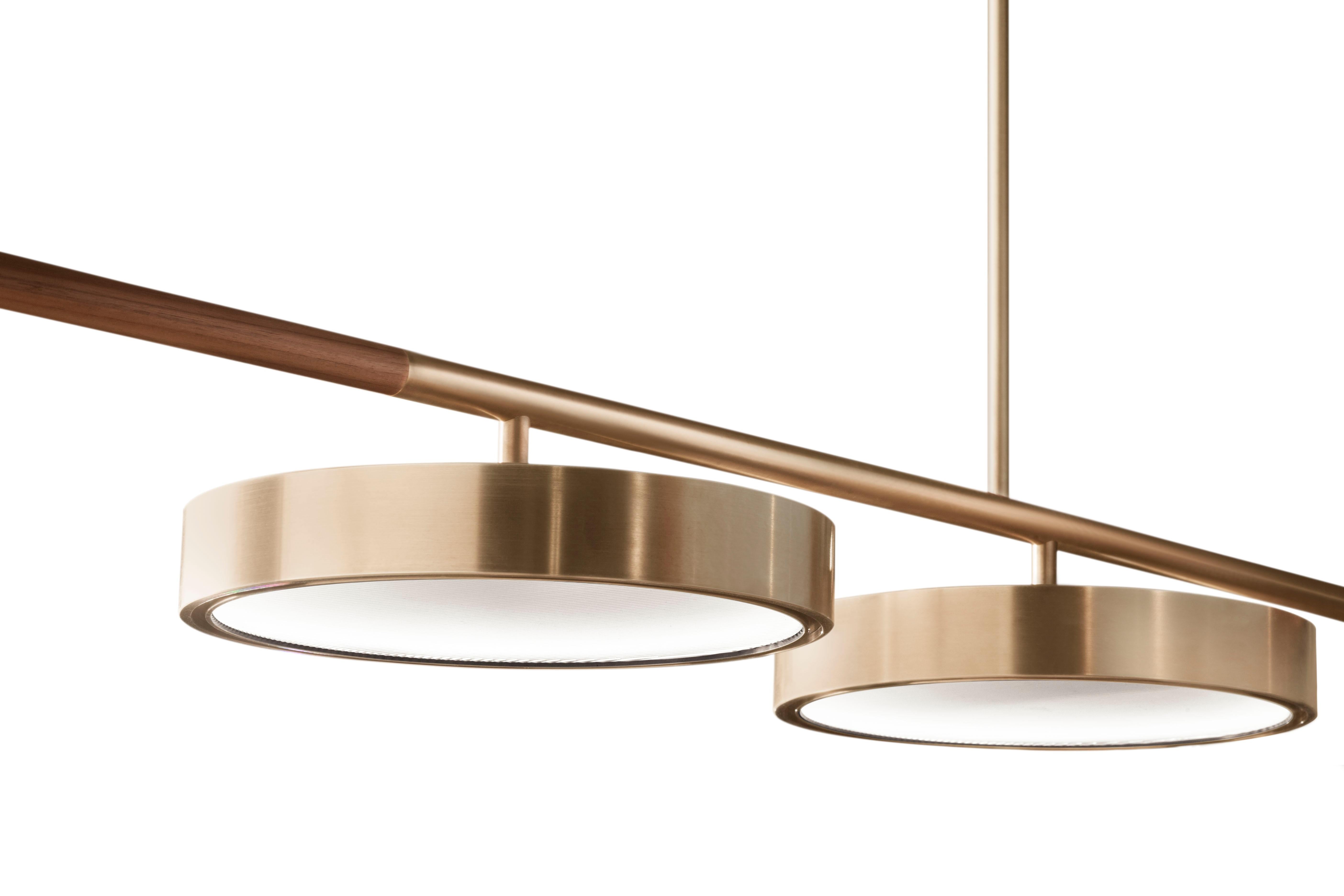 The QD09 hanging lamp is made with brass, wood and thin ribbed glass. Measures: The standard length is 300cm and height is 110cm and the diameter of each light is 25cm.

Please note that due to the current increase in raw material cost, prices must