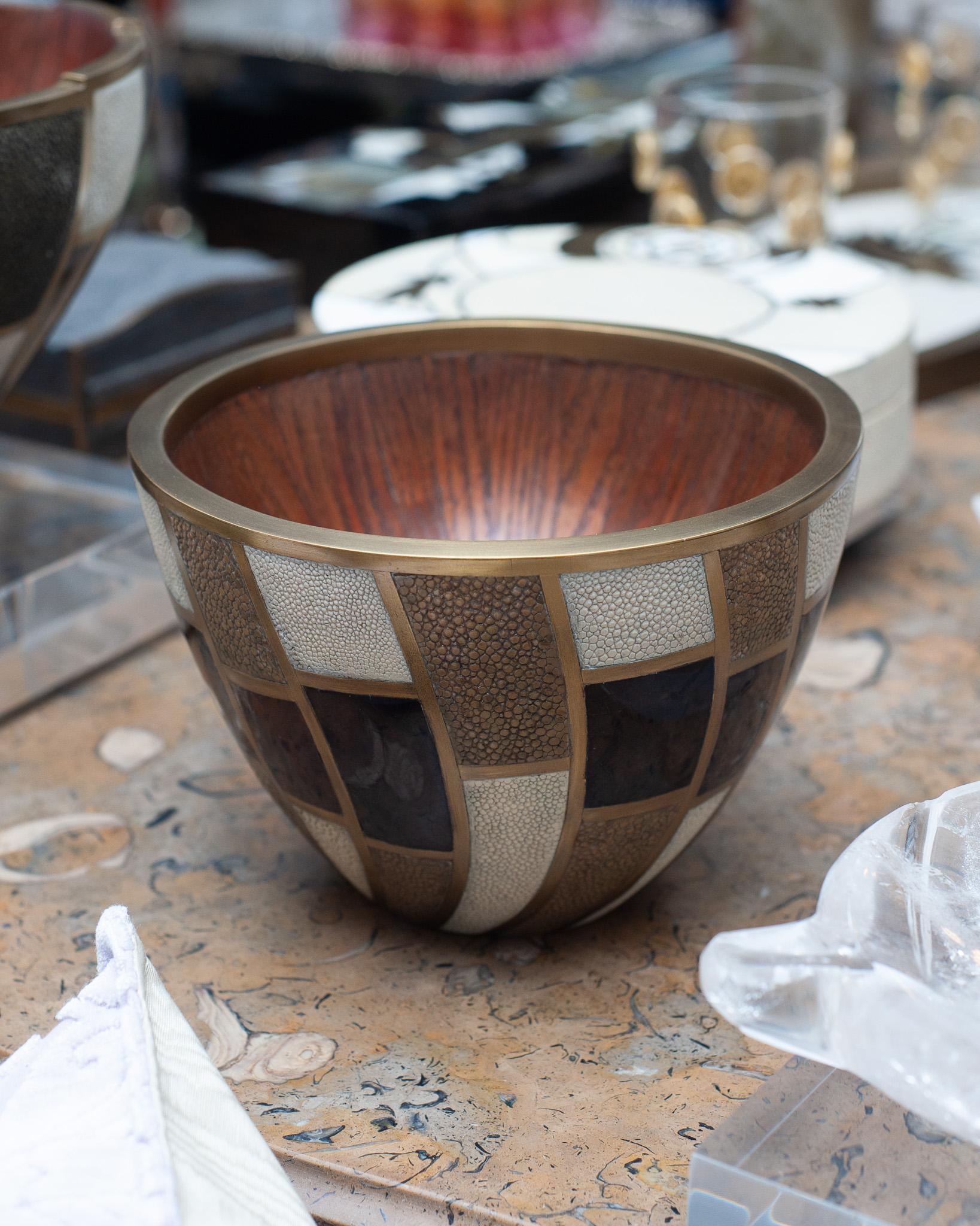 In stock now - A gorgeous walnut bowl made R & Y Augousti, with brass borders inlaid with creme & earth tone shagreen and brown penshell. Expertly crafted, this decorative bowl is a perfect sculptural accessory for any table and is as beautiful as