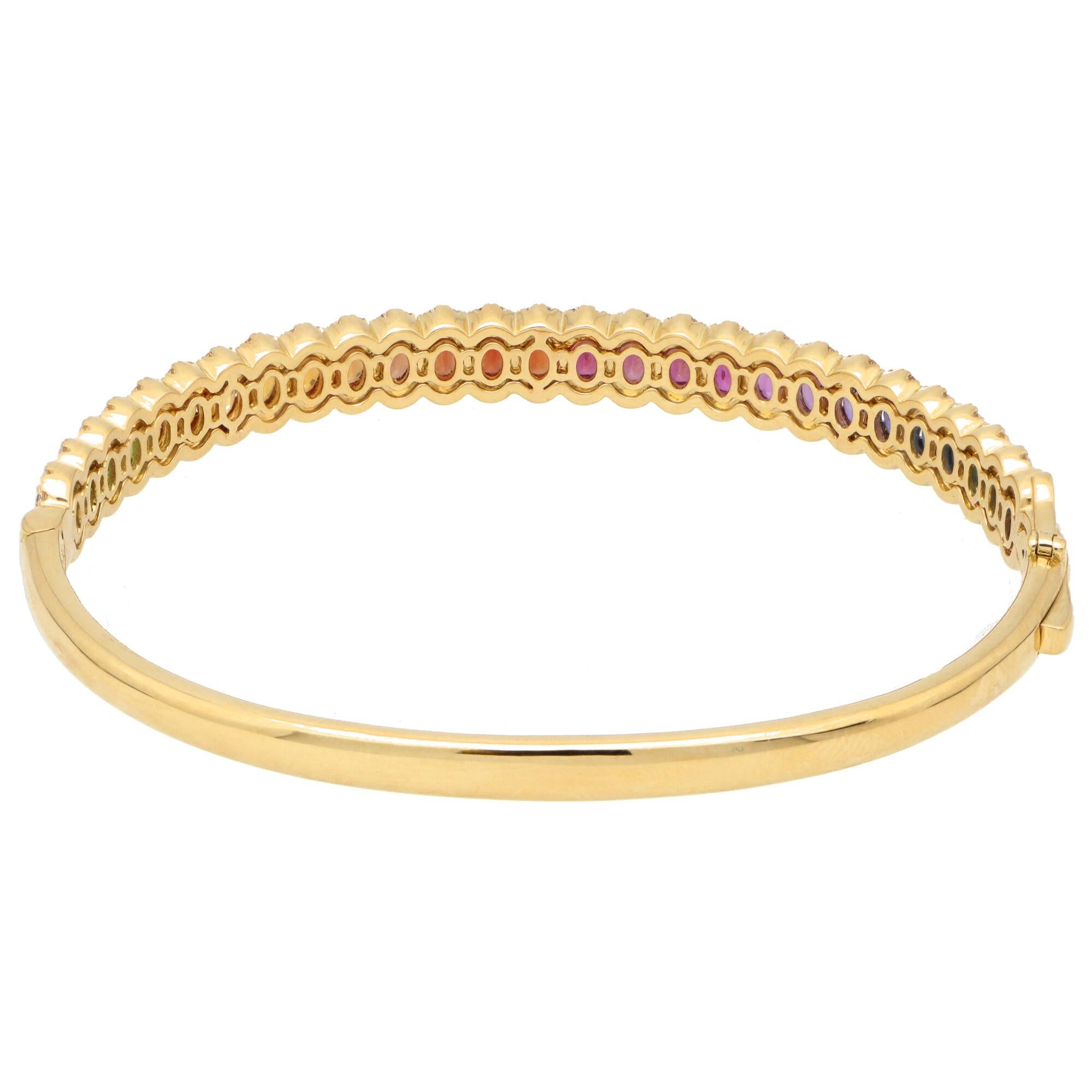 Oval Cut Contemporary Rainbow Sapphire and Diamond Hinged Bangle Set in 18k Yellow Gold