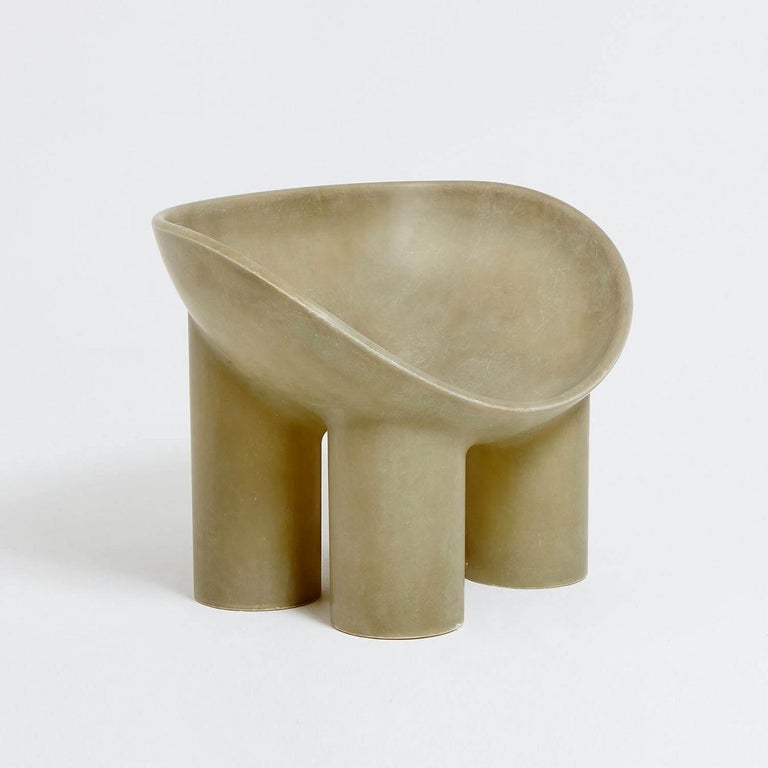 Contemporary fiberglass chair - Roly Poly chair by Faye Toogood. This is shown in the raw fiberglass finish. 
Design: Faye Toogood
Material: fiberglass 
Available also in cream or charcoal finish

The Roly Poly chair is the anchor piece of Faye