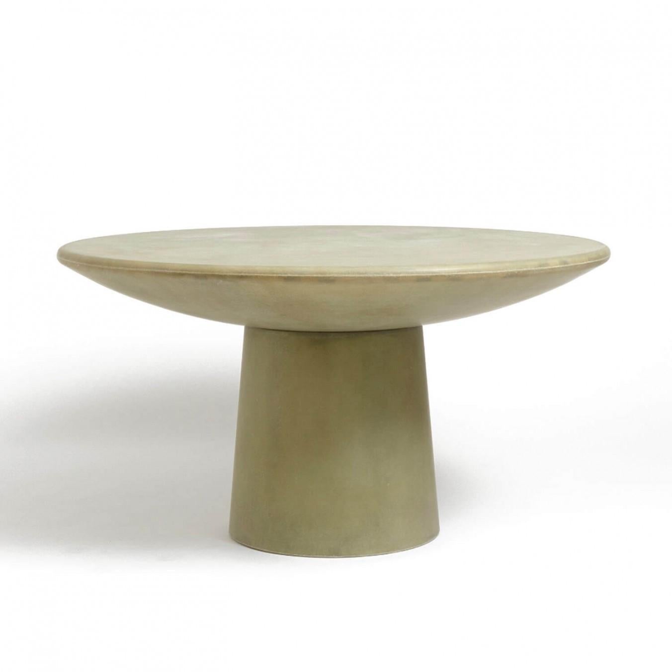 Contemporary fiberglass dining table - Roly Poly dining table by Faye Toogood. This is shown in the raw fiberglass finish. 
Design: Faye Toogood
Material: Fiberglass 
Available also in cream or charcoal finish

The Roly Poly chair is the anchor