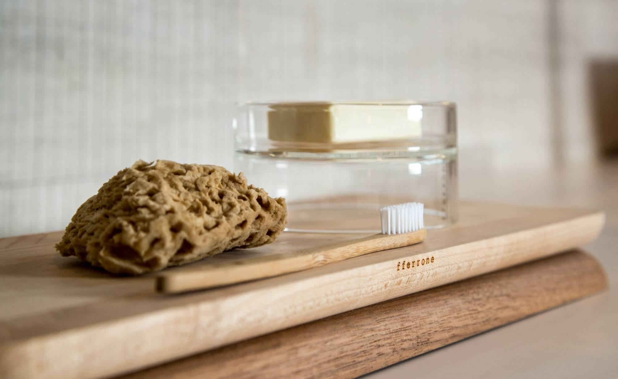 This contemporary serving board, conceived of as a centrepiece, chopping board, serving board, or tray, the Doppio is elegant when in use and when simply sitting on a table or counter. Handcrafted and finished, made of maple and walnut woods, the