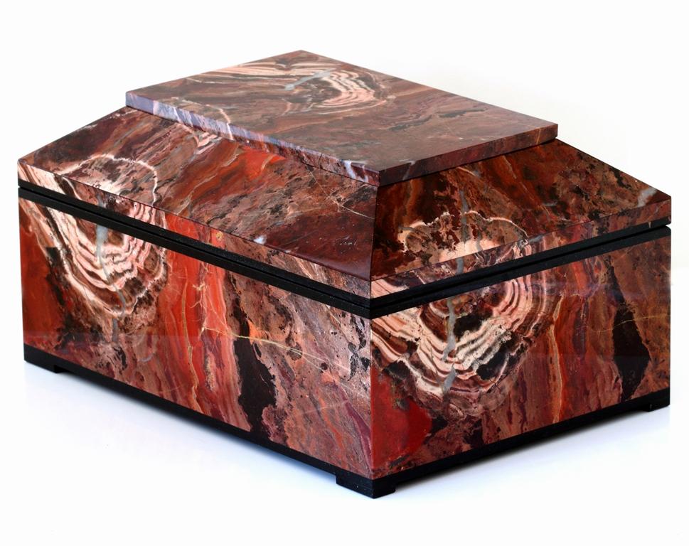 Invite healing energy into your home with an exquisite red jasper box. This box is beautifully made with a hinged lid and bookend matching of the natural veins of the stone. Lined in black velvet with black marble trims. Finished to a high polish to