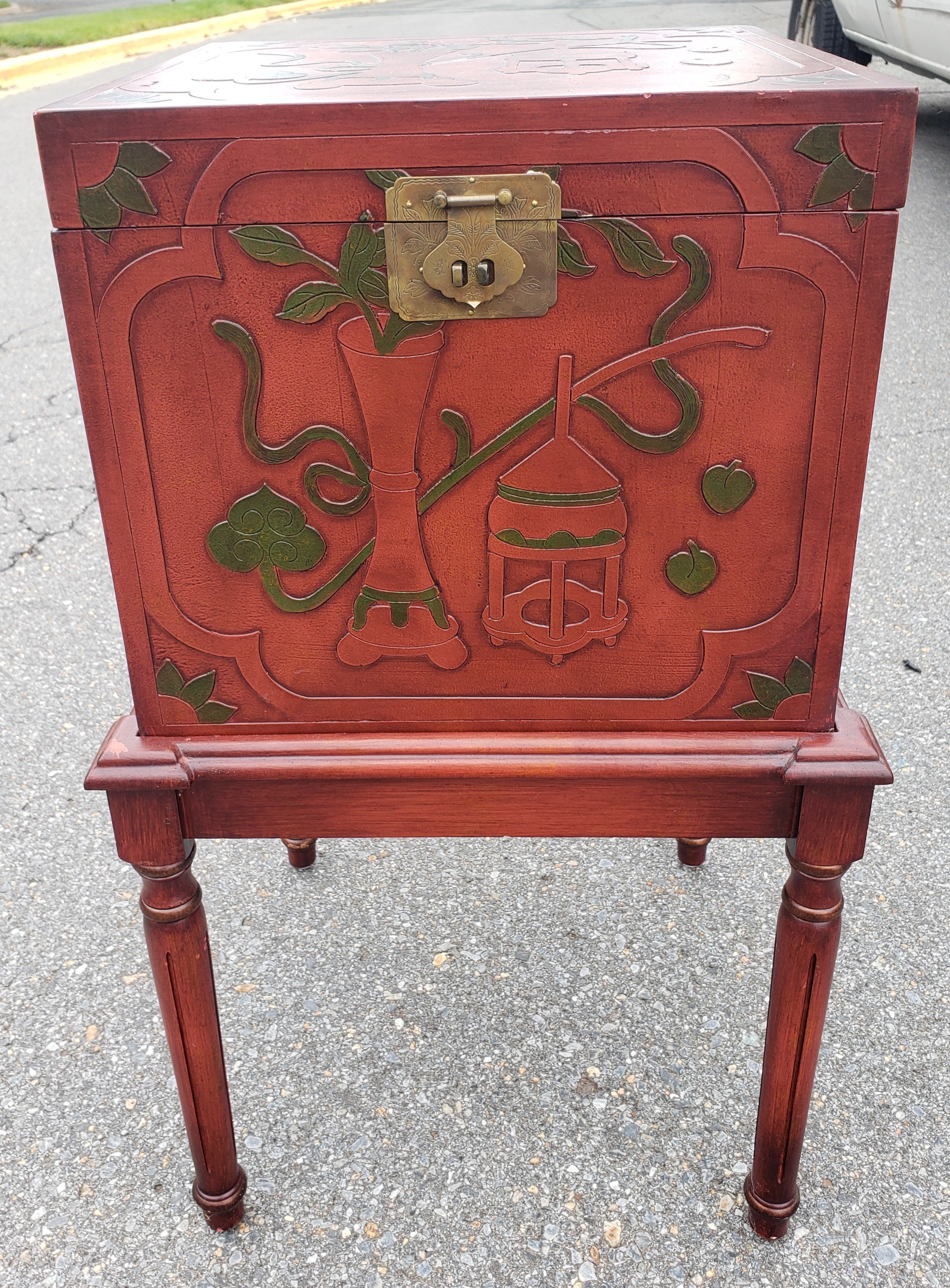 A Contemporary Red Lacquered and Ornate Asian Storage cabinet or Filing Cabinet on Stand. Inside Felt lined and stand top. Very good vintage condition. comes with removable filing rack and file hangind rails. Measures 17