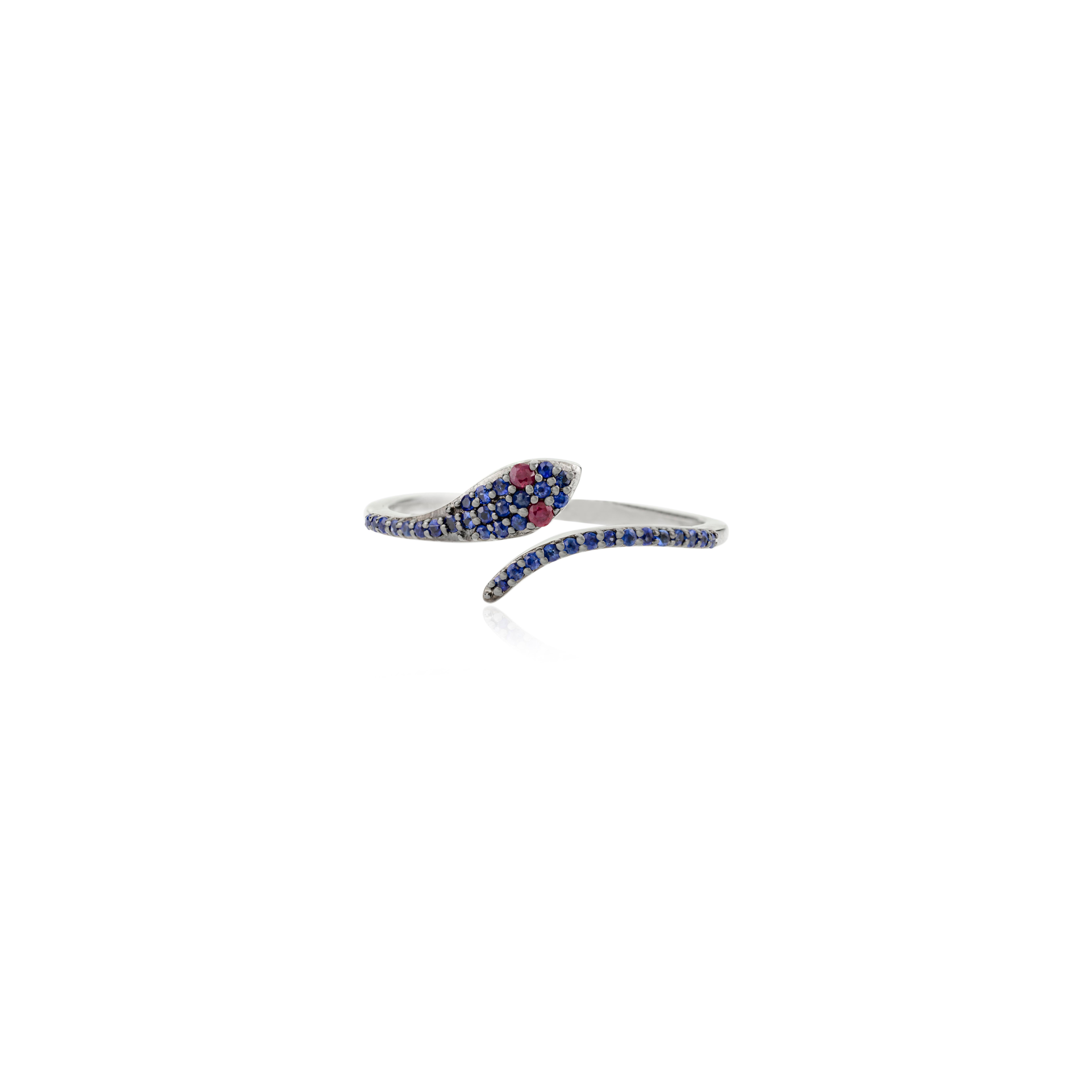 For Sale:  Contemporary Red Ruby Eye Pave Blue Sapphire Thin Snake Ring in 18k White Gold 5