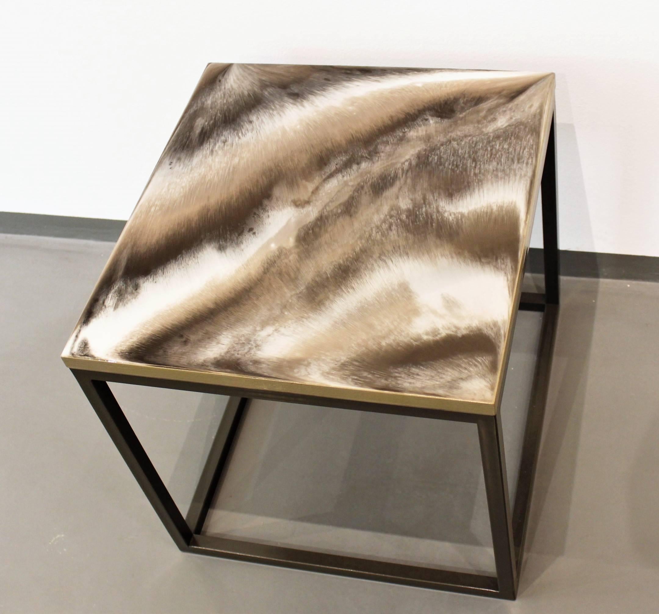 This side table is a unique creation, part of Viscosity Art & Resin Gallery art furniture collection.
Smooth transitions of neutral and earth tones of resin, make this table balance with elegance between contemporary vintage and Nordic style