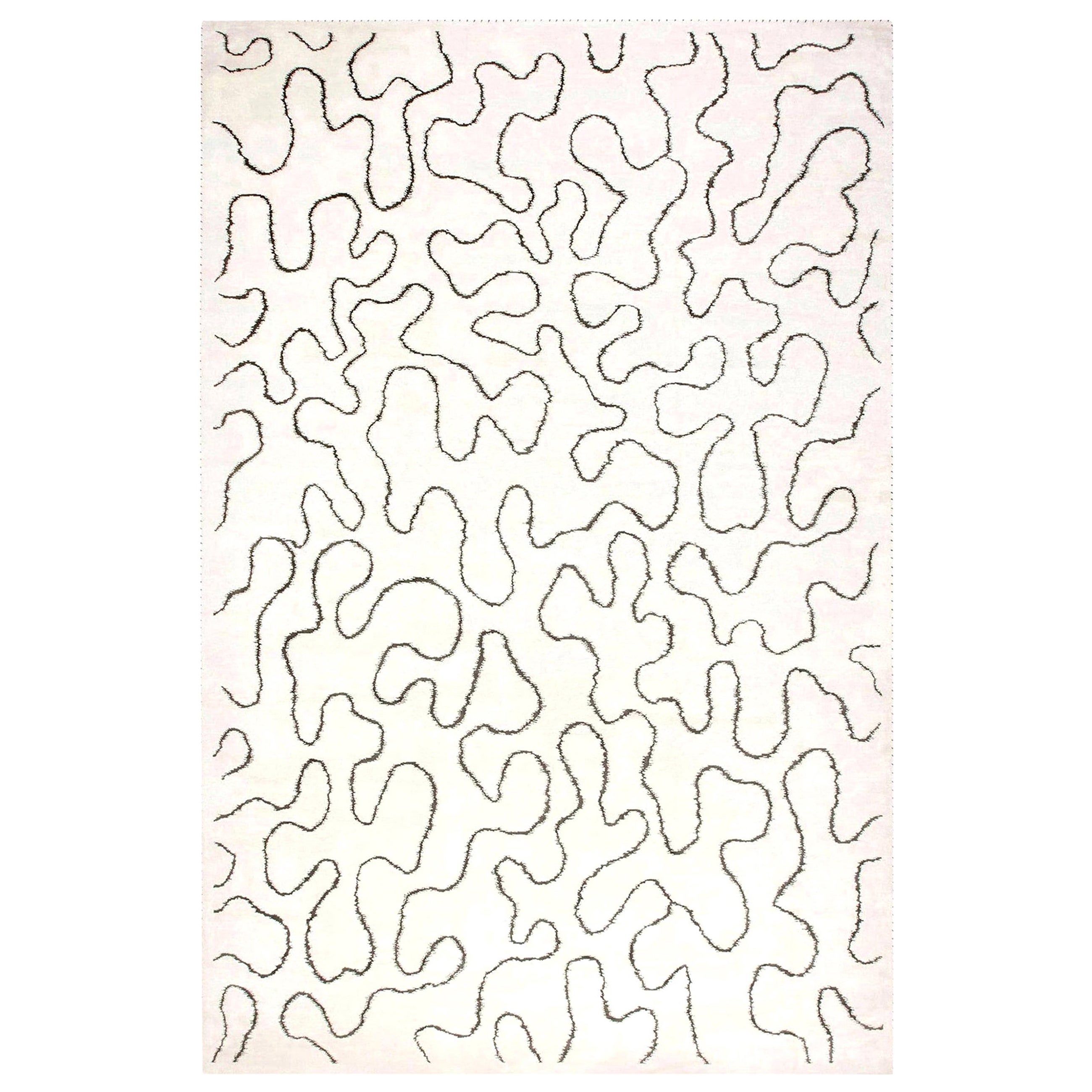 Zeitgenössischer weißer handgefertigter Wollteppich mit Schleifendesign von Doris Leslie Blau