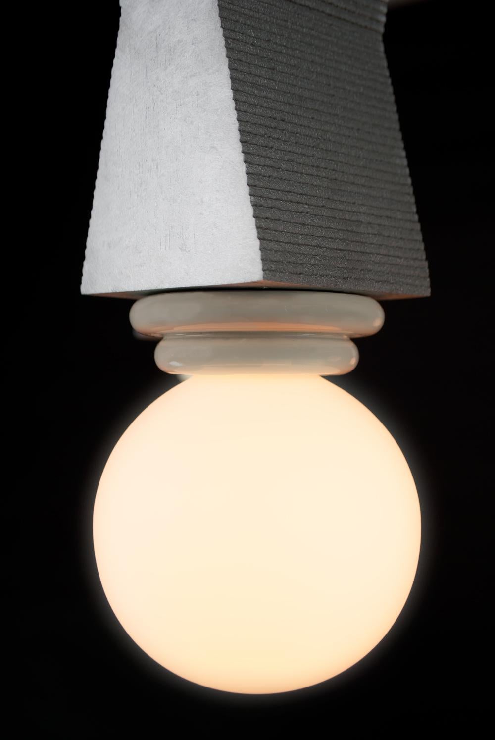 Molded Contemporary Ridge Chandelier Light with Geometric Aluminium and Opal Globe Bulb For Sale