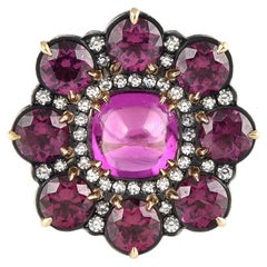 anello contemporaneo Arteau Paris con granati e diamanti