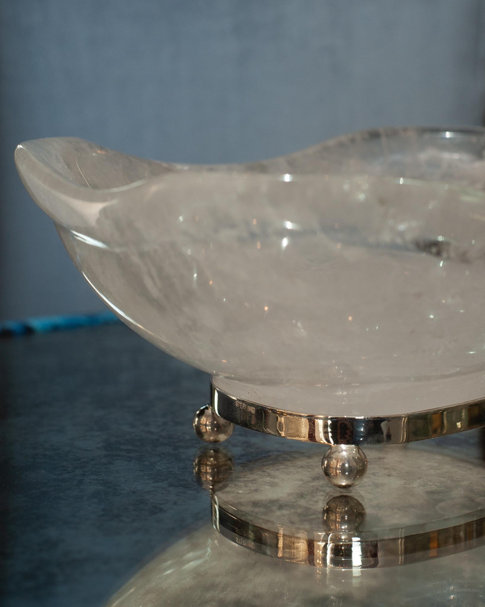 Bring the healing energy of rock crystal into your home with this beautiful carved bowl. This delicately carved bowl with a scalloped edge can filled with candies or kept sculptural as an empty vessel and placed in any space.