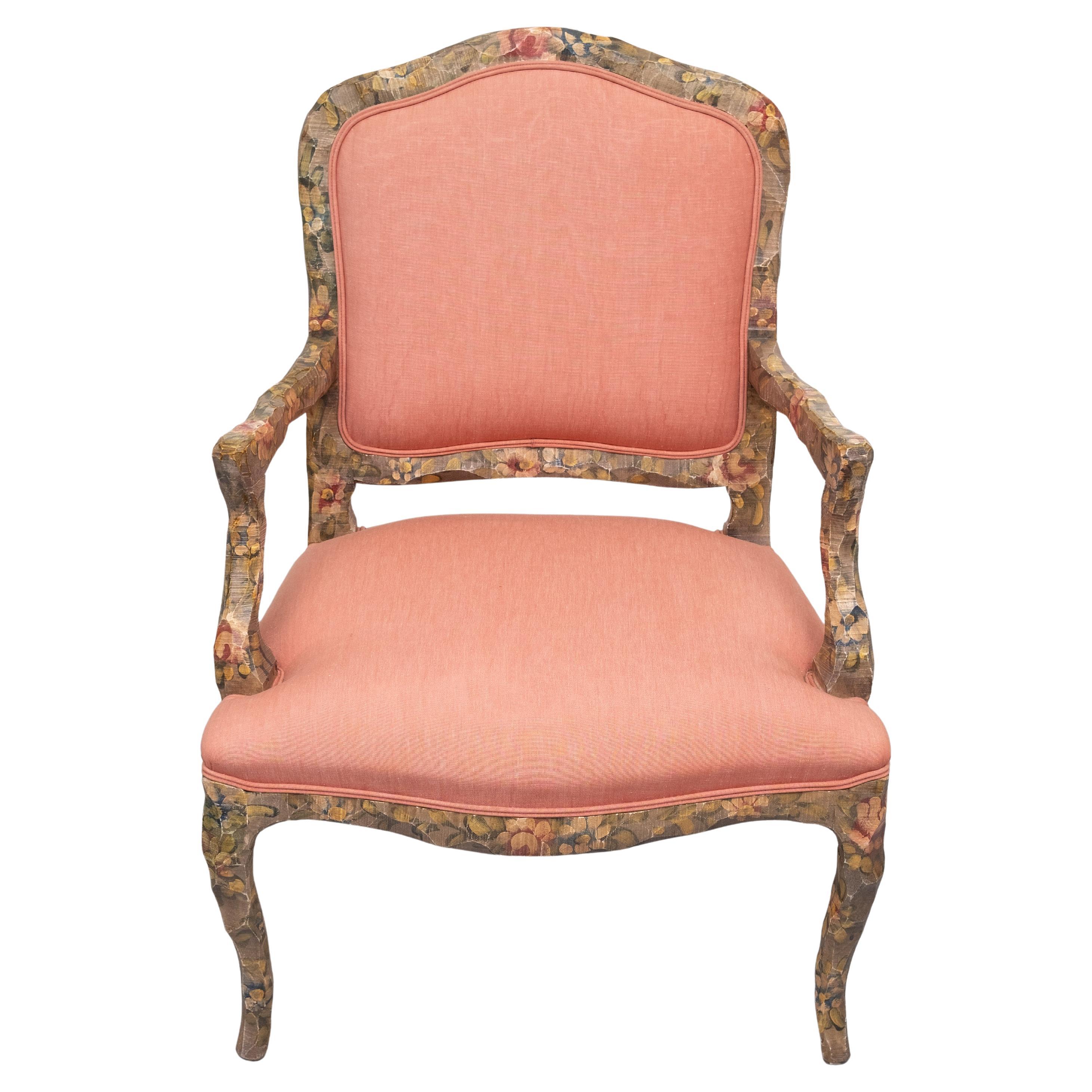 Looks like a traditional Rococo style armchair and ottoman . But look again   Hand carved and painted with Flowers .  This contemporary version is very attractive and well done . comes with a Pink Damask upholstery .
Curved Ottoman fits precisely in