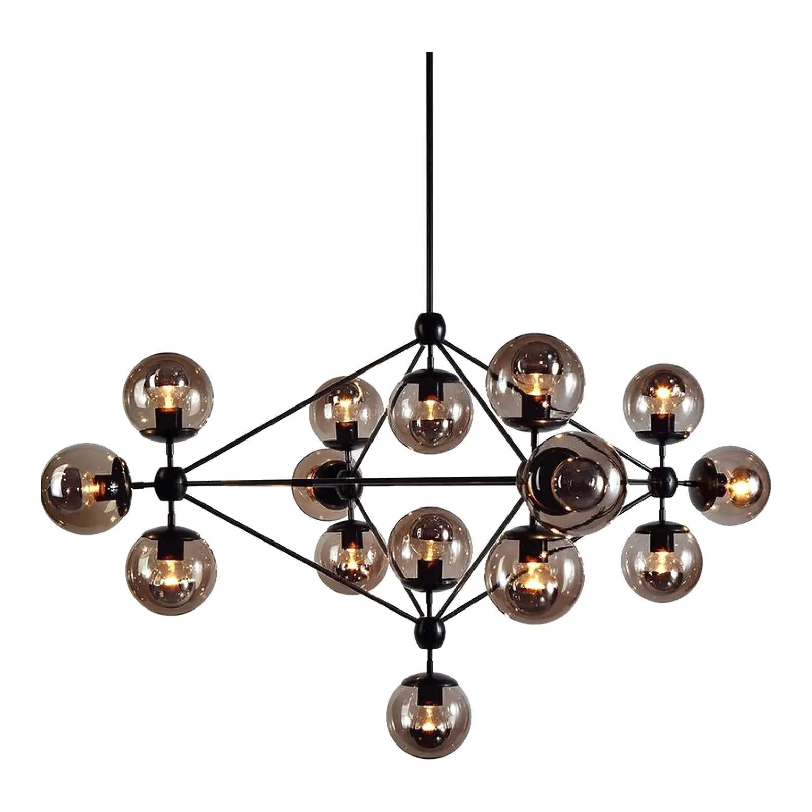 A fantastic Contemporary roll and hill chandelier. The iconic Modo Diamond 13 globe design. Beautiful tinted hand blown globes on a geometric machines aluminum frame. Absolutely striking. Acquired from a Miami estate.
