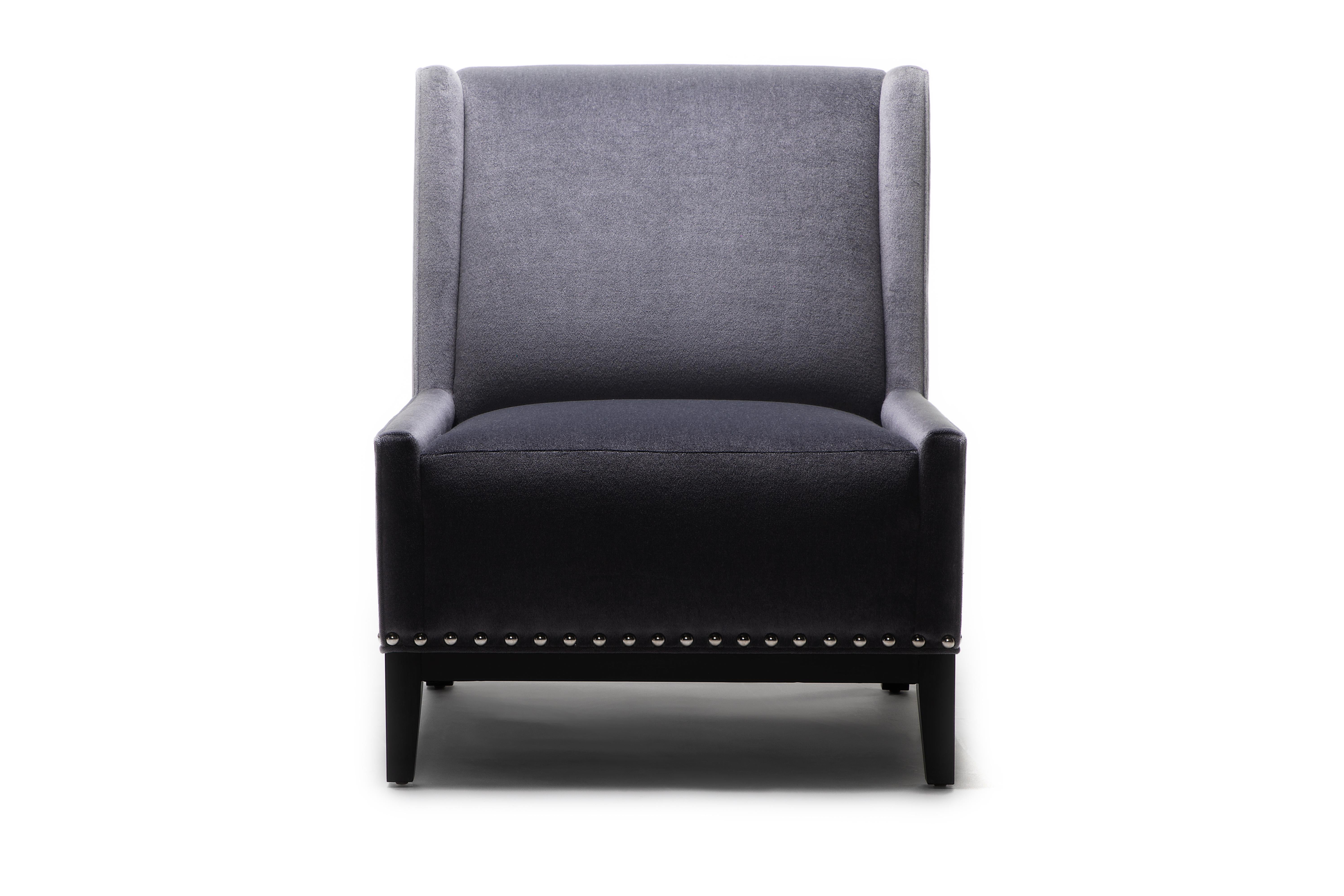 Meet Roma, a confident piece that commands attention whether he is placed at the head of your dining table or in a power position in your office. Covered in leather or supple mohair fabric, his tall, sturdy backing and chrome nail heads add a touch