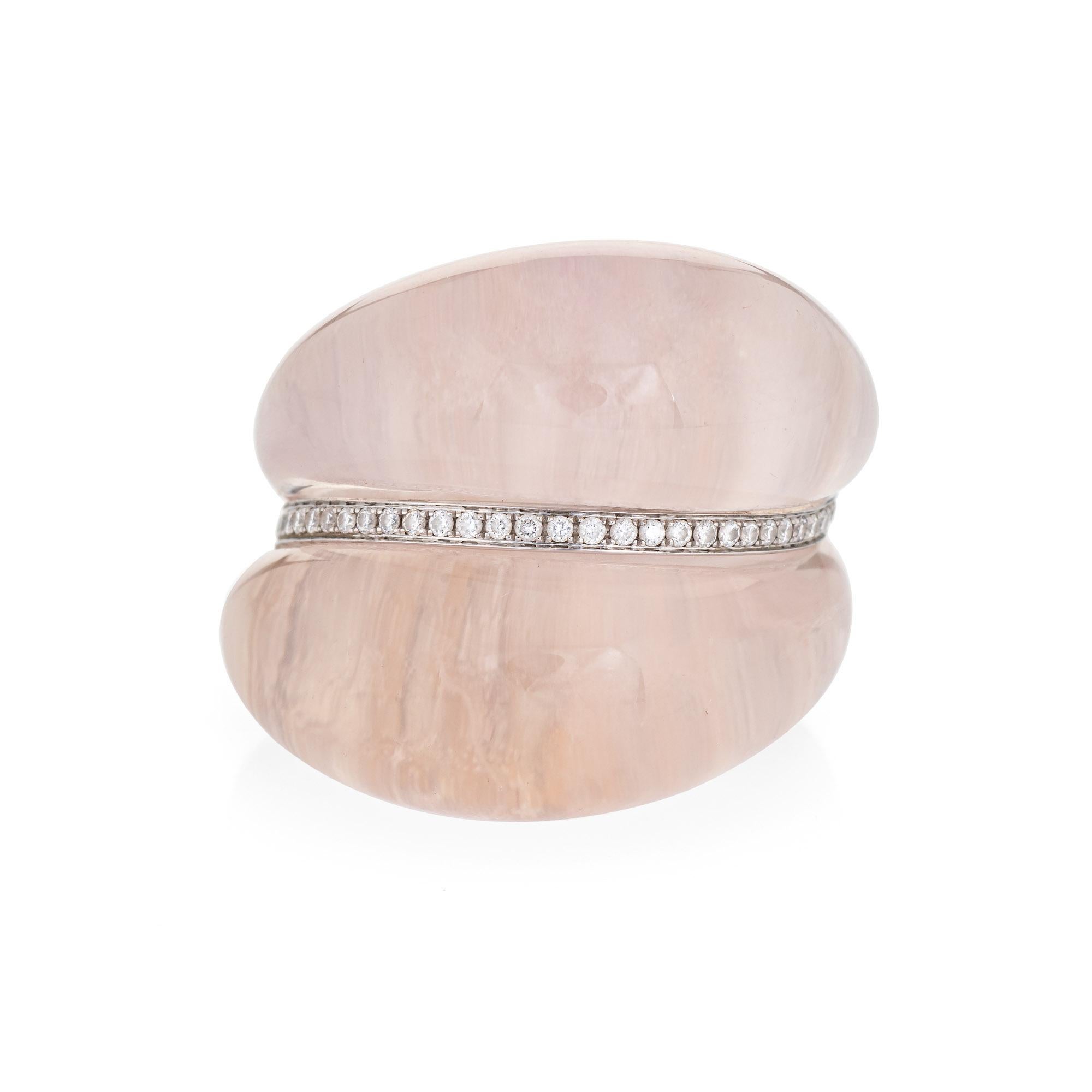 Stylish contemporary rose quartz & diamond ring crafted in 18 karat yellow gold. 

Cabochon cut rose quartz measures 30mm x 26mm. 37 diamonds total an estimated 0.118 carats (estimated at H-I color and VS2-SI1 clarity). The rose quartz is in very