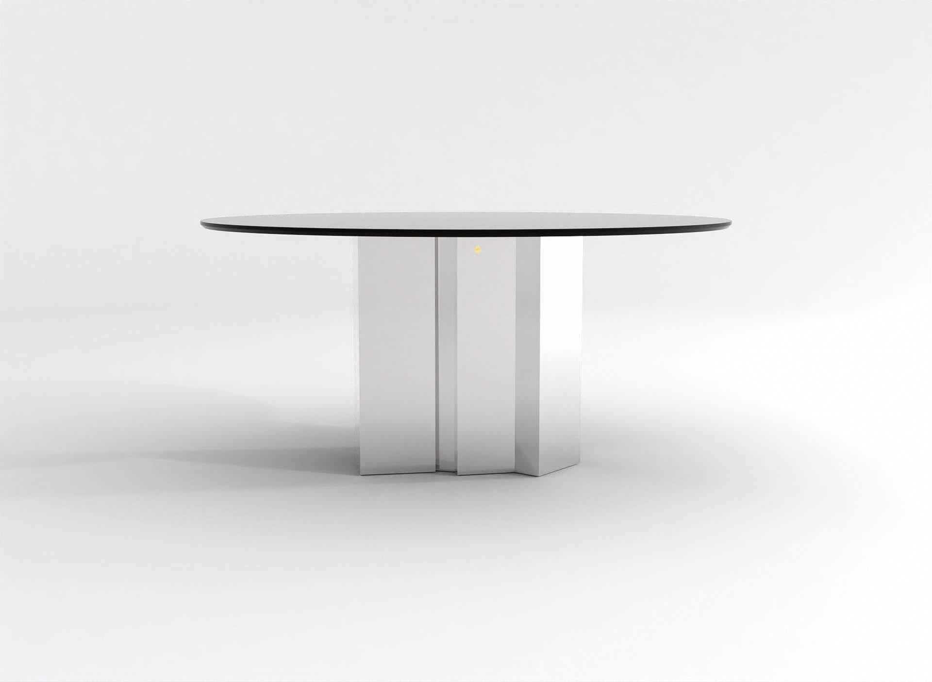 Our barh beam table deserves being in the center of attention. The heavy, robust and stable base contrasts stunningly with the elegantly thin and fragile table top. The architectural character of the central leg excites the mind along all sides.