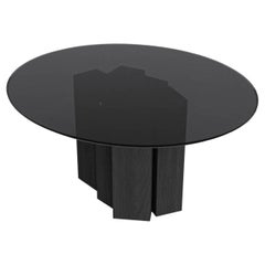 Tavolo da pranzo rotondo contemporaneo in vetro colorato nero e legno di frassino colorato nero