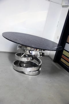 Contemporary Round dining table in Nero Marquina marble, Stainless steel base