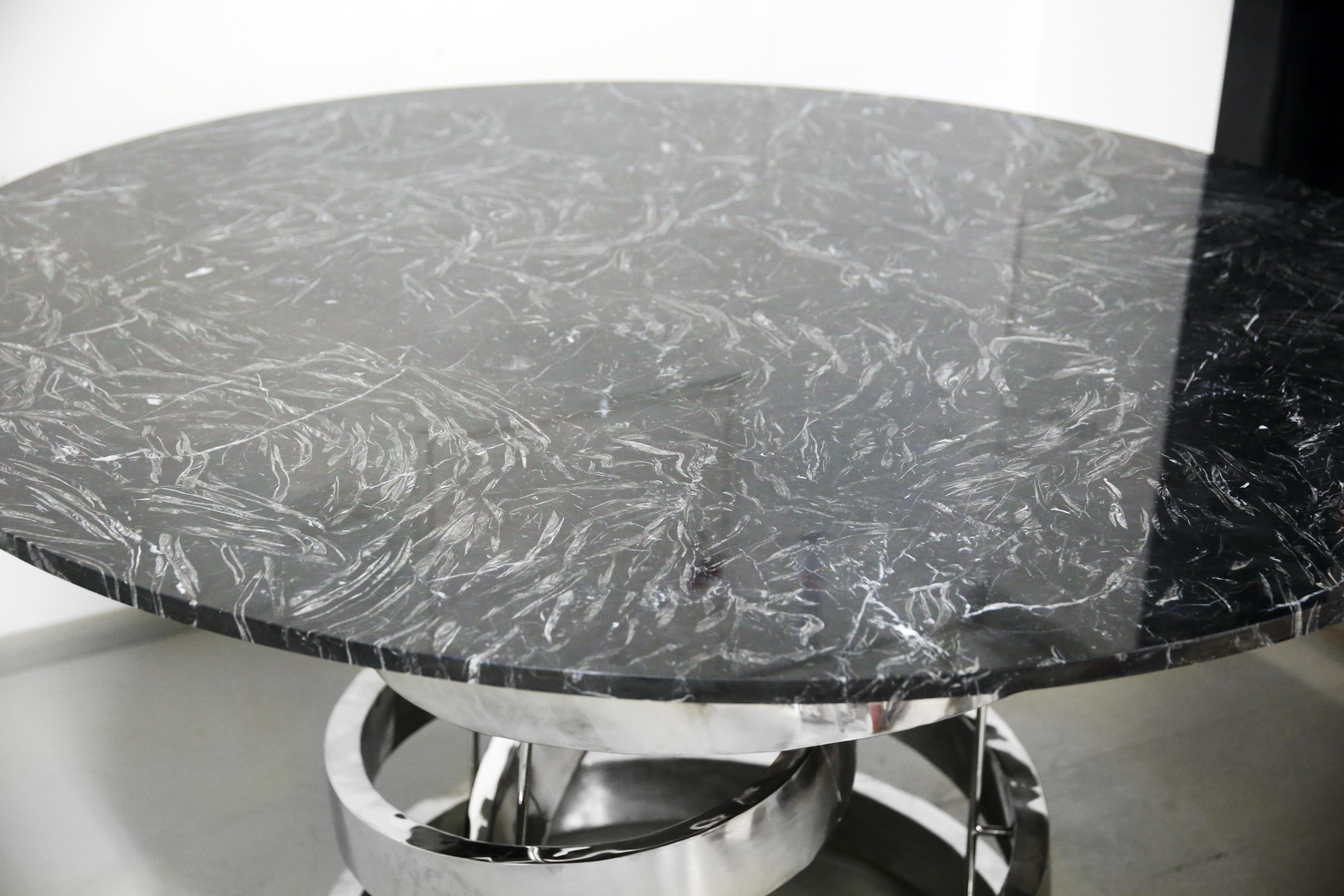 Baltic Contemporary Round dining table in Nero Marquina marble, Stainless steel base For Sale