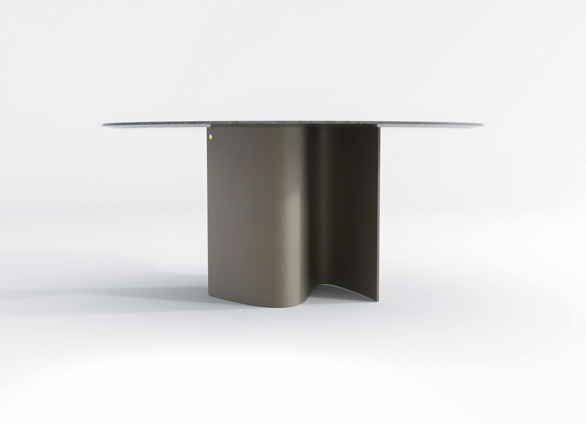 barh wave table is designed with a contrasting design language. The wavy base supporting a rigid and static table top creates a powerful piece of furniture.
The metallic aspect of the wavy base plays with light and shadows, feeding curious minds.