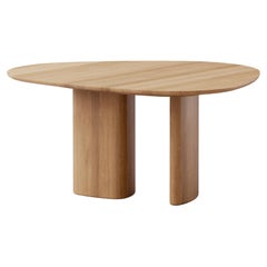 Mesa de comedor redonda contemporánea "Tangent" de Anne Boysen x DK3, roble lacado