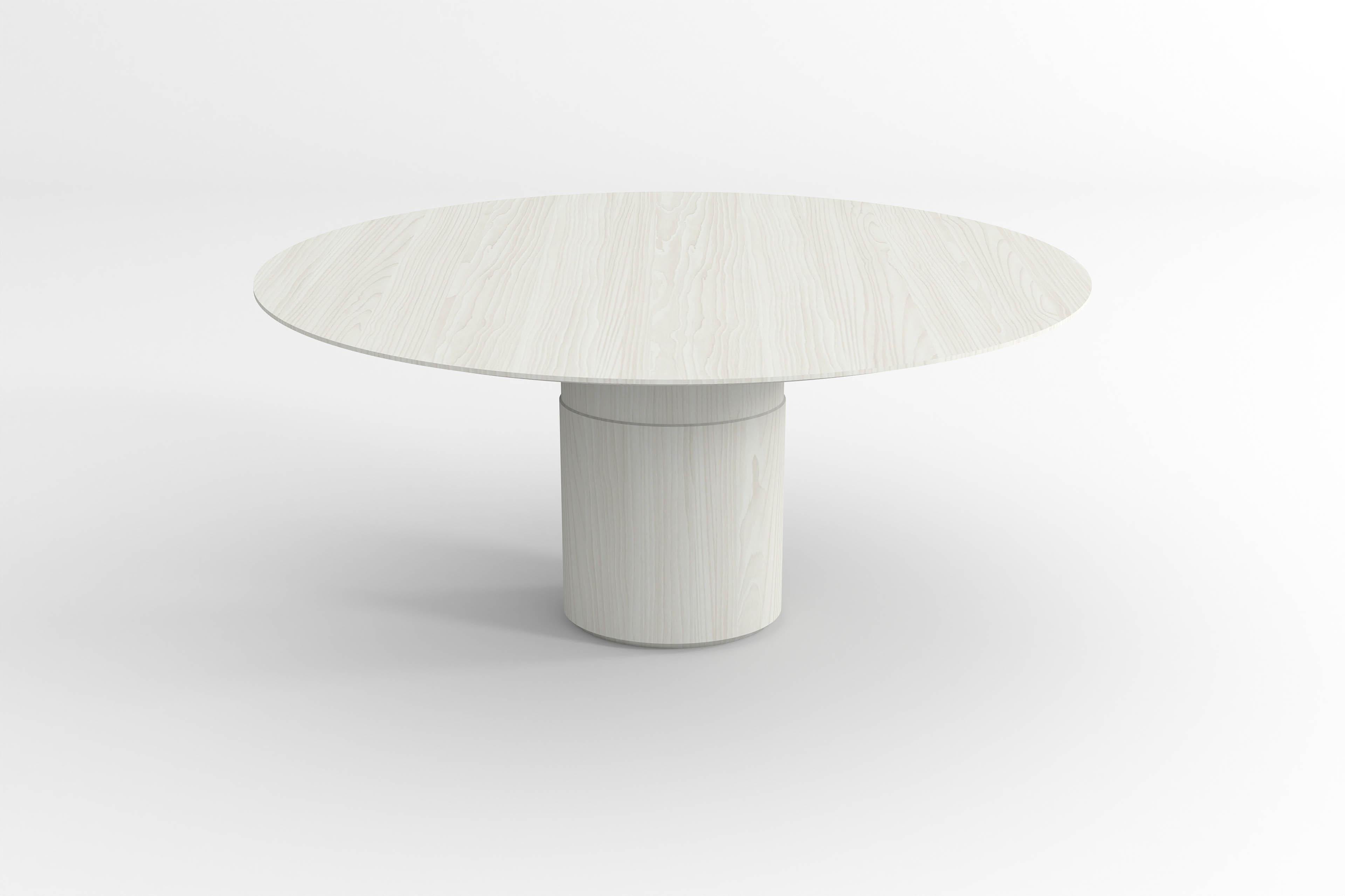 La table d'undisc nous fait voir la jambe centrale d'une manière différente. Il se passe quelque chose, mais de façon modeste. Simple mais raffinée, elle offre une table de salle à manger centrale qui se dissout dans la pièce où elle se trouve et
