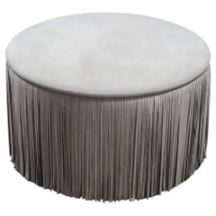 Contemporary Round Leather Ottoman with Fringe Detail