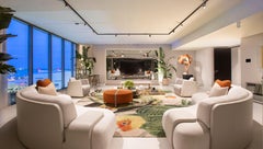 Contemporary Round Leather Ottoman with Leather Belts