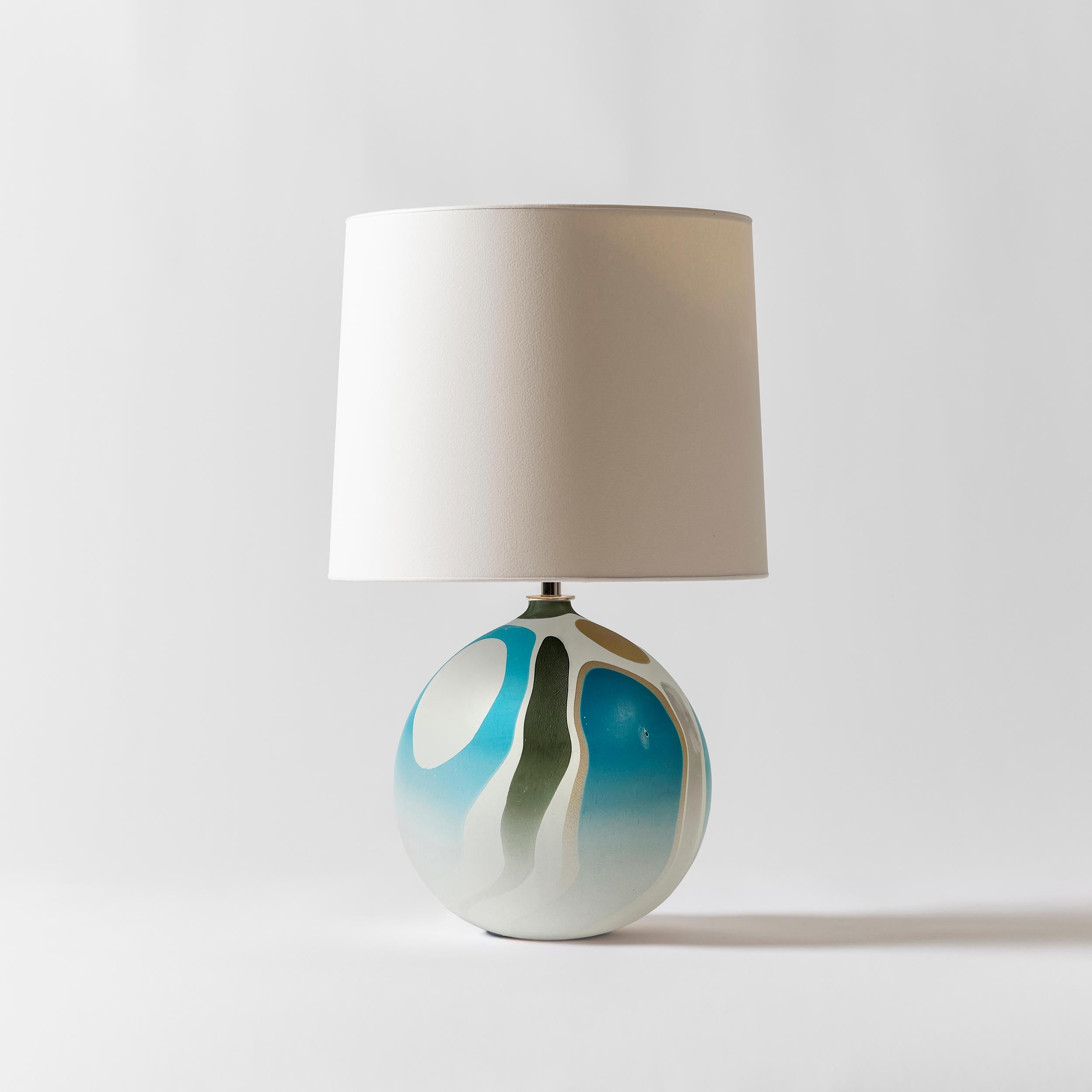 Our Hydro Collection is inspired by the grooves and patterns that waterways make through the landscape as seen from above. The layers of gradation in the pigment on the exterior of the bases reference topographical maps. We take queues for our