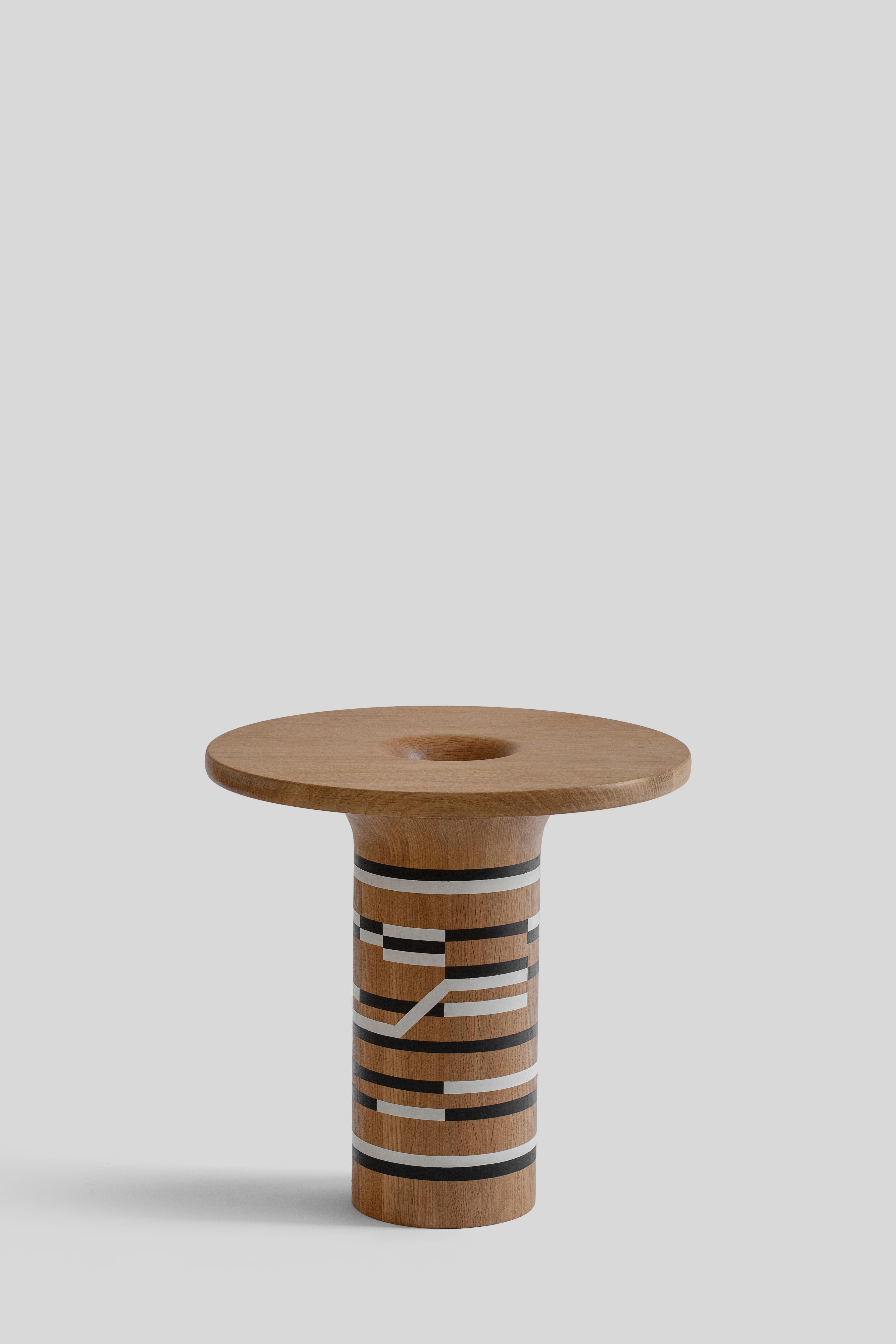 The Akopechtli Komali side table is the result of the collaboration between Sebastián Arroyo Hoebens and Elena Boils. The design was inspired by the round shape and thin edges of the Comal.

There is much to say about the Comal: there are many