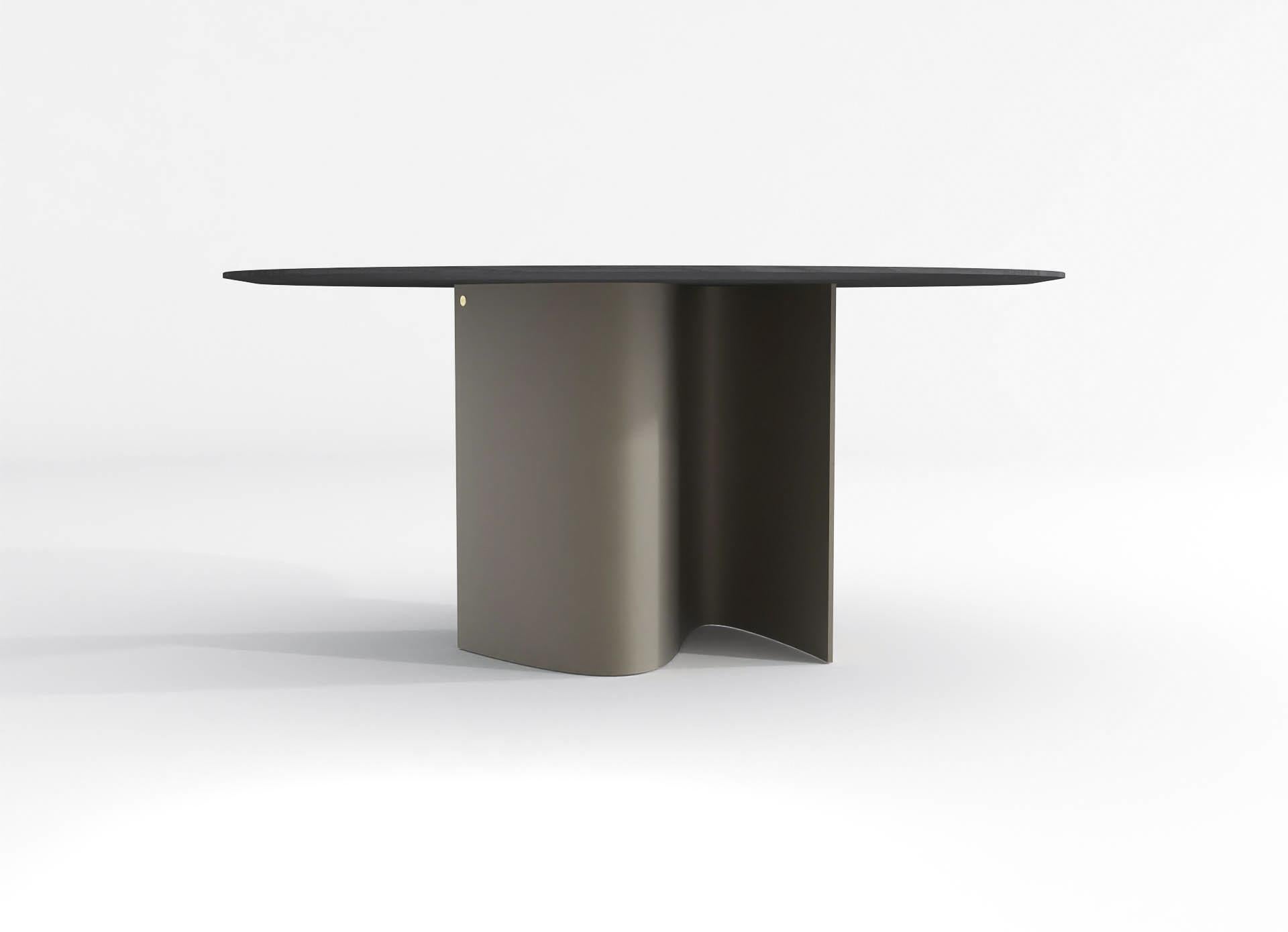 barh wave table is designed with a contrasting design language. The wavy base supporting a rigid and static table top creates a powerful piece of furniture.
The metallic aspect of the wavy base plays with light and shadows, feeding curious minds.