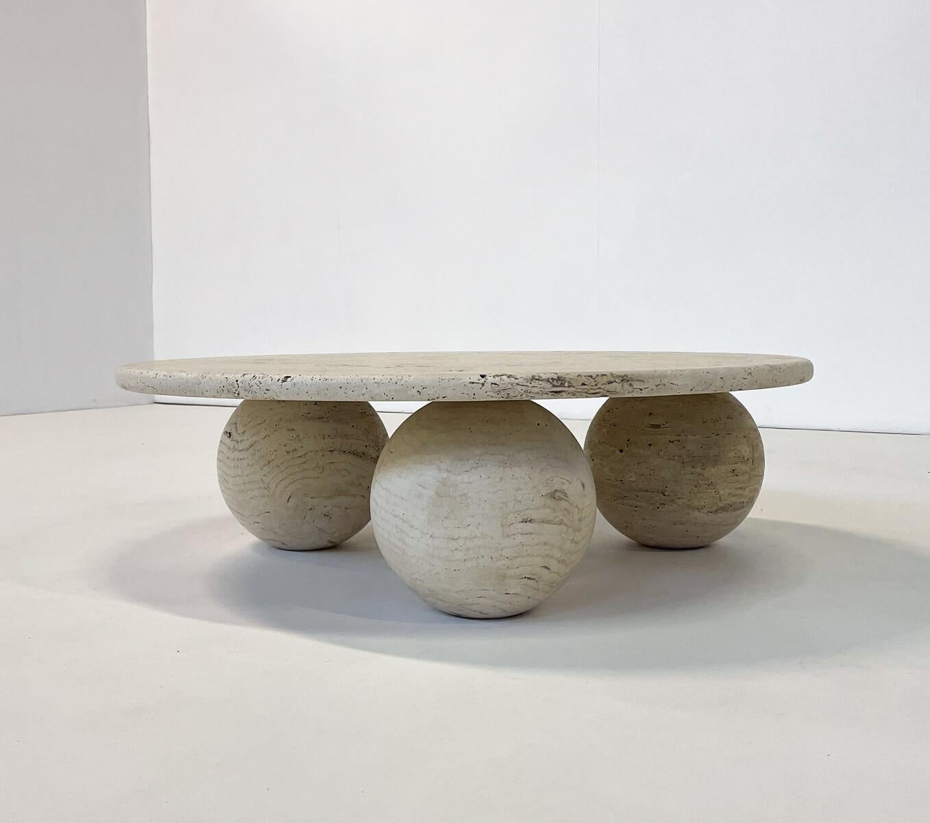 Contemporary round Travertine coffee table, Italy.