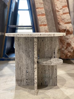 Contemporary refined round side table, travertine, Belgian design