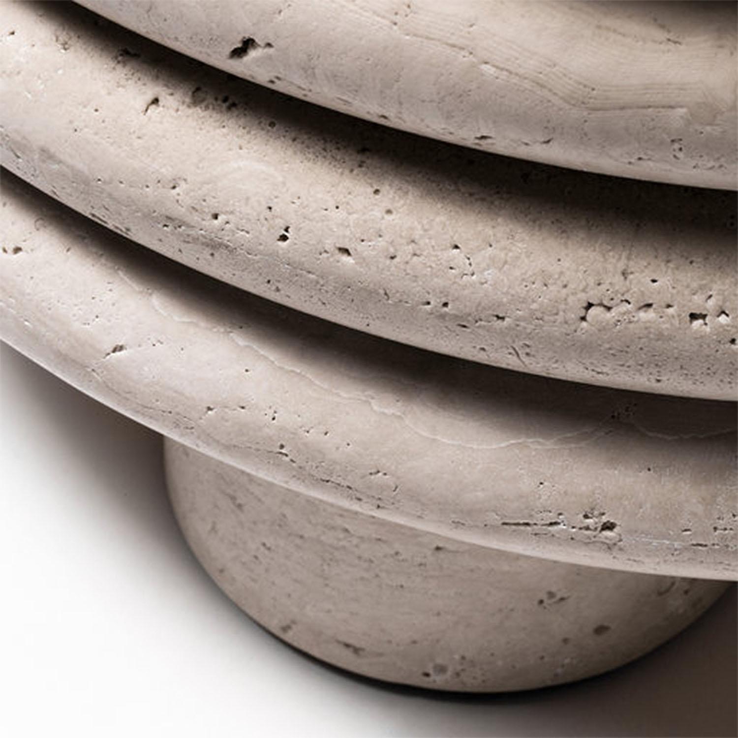 Contemporary round travertine stool - Scala by Stephane Parmentier for Giobagnara.

Organic shapes take center stage in the Scala Collections designed by Stephane Parmentier for Giobagnara. Featured in travertine, this stool boasts the recurring