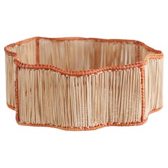 Contemporary Round Wavy Woven Rattan Bowl / Basket in Coral