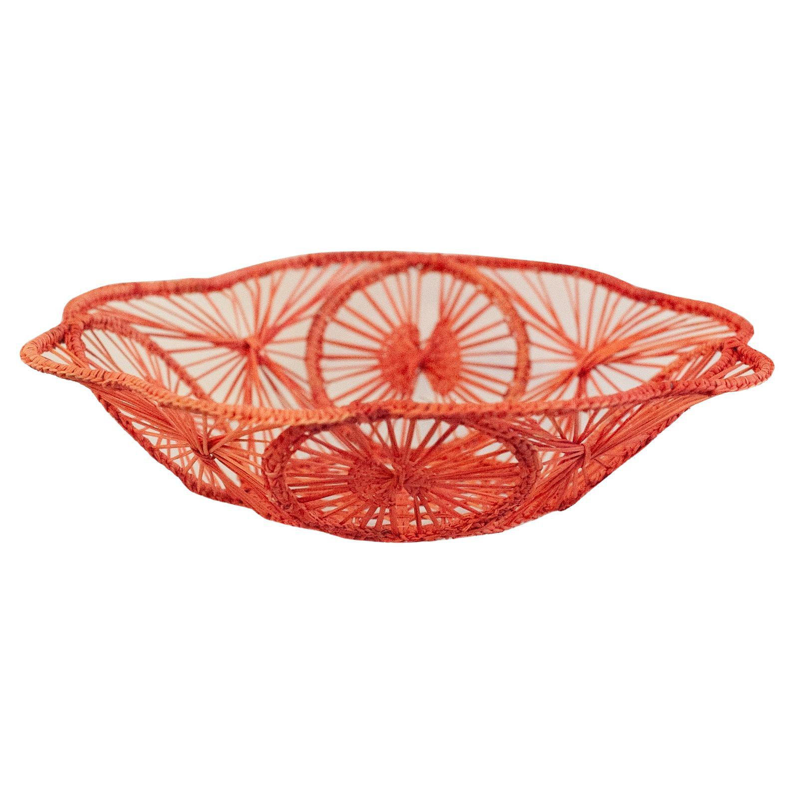 Bol / panier rond contemporain en rotin tressé en corail