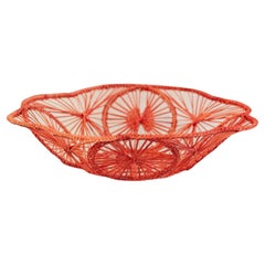 Bol / panier rond contemporain en rotin tressé en corail